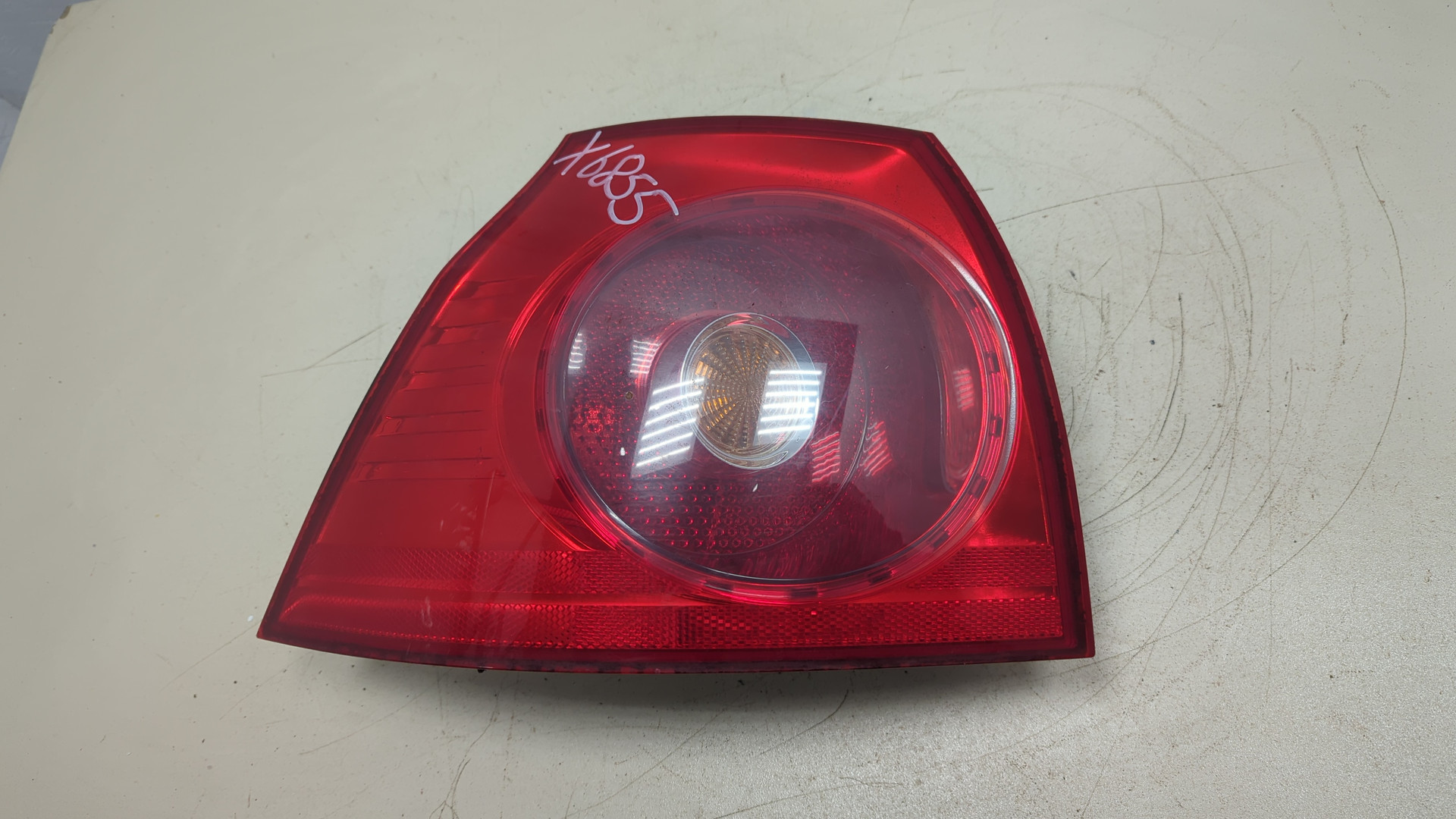 Фонарь задний левый