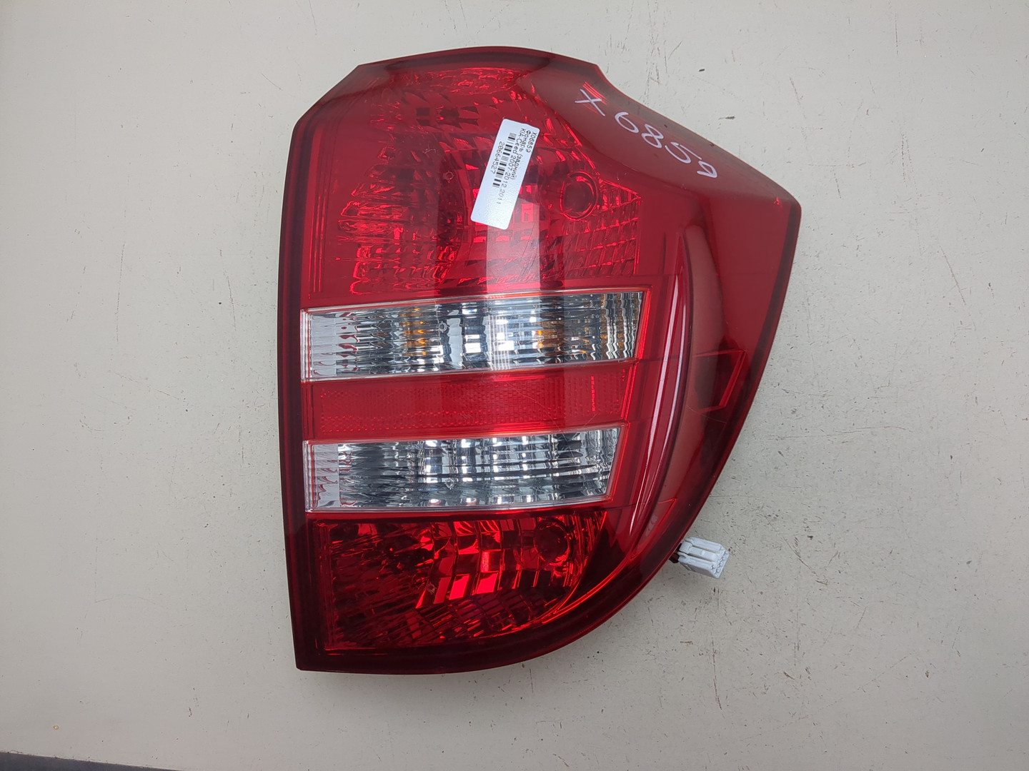 Фонарь задний левый