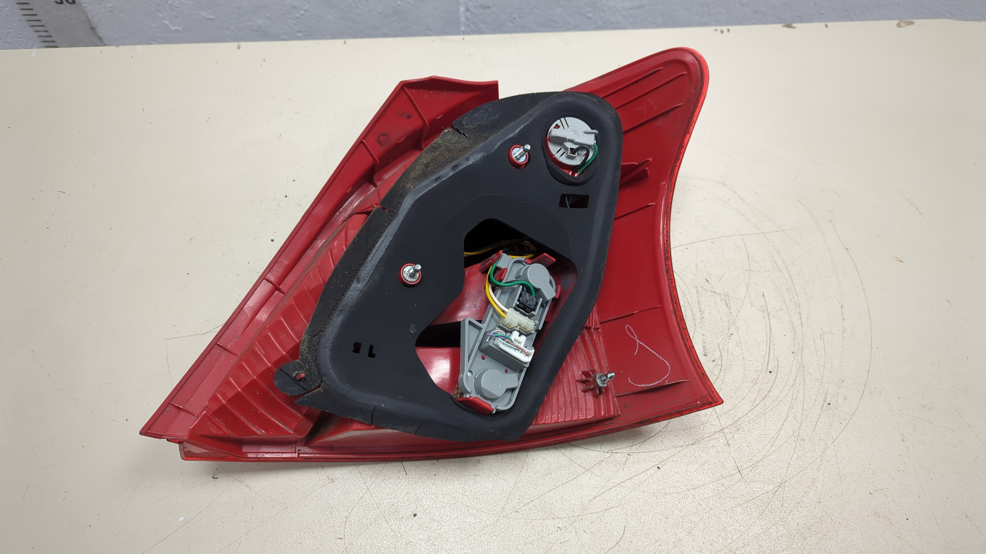 Фонарь задний левый