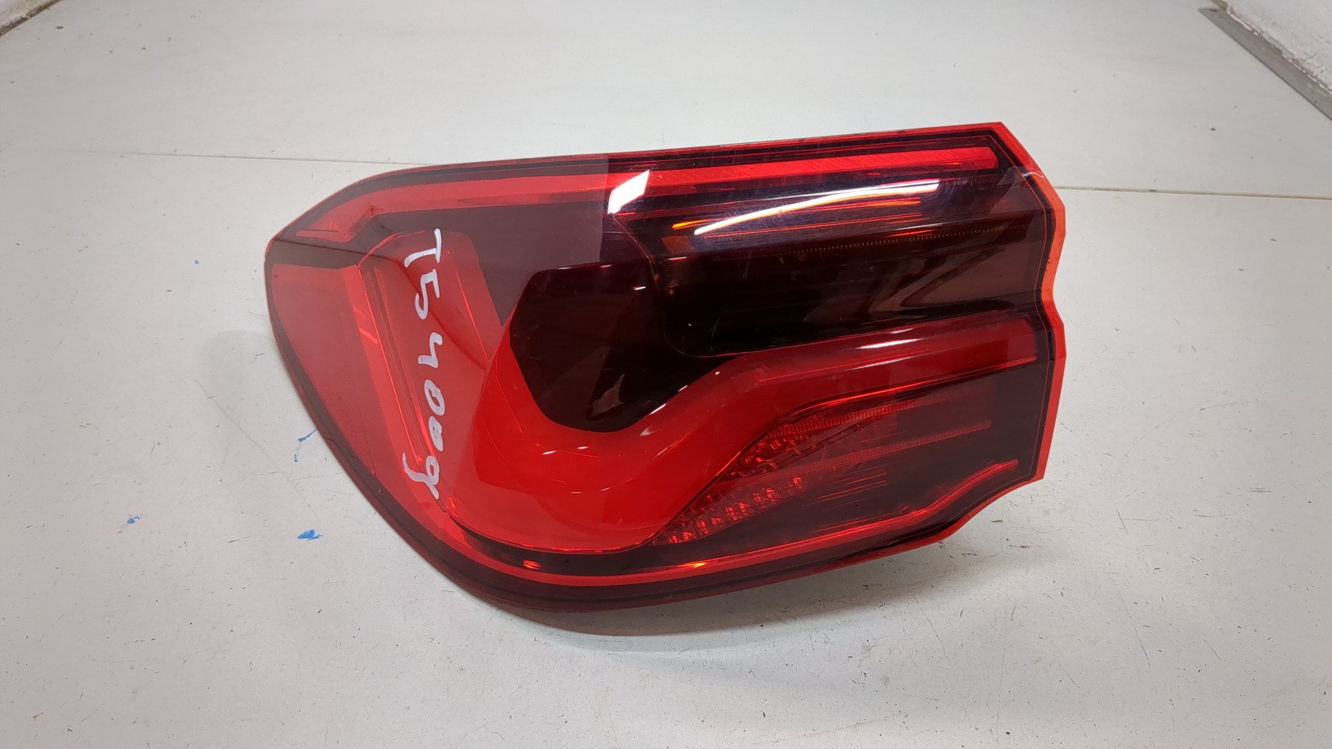 Фонарь задний левый