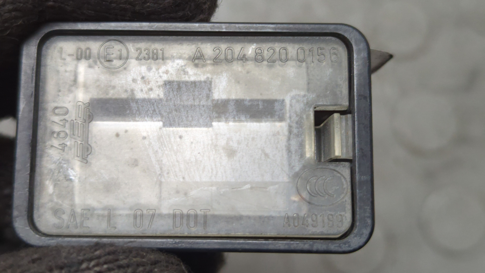 Фонарь подсветки номера