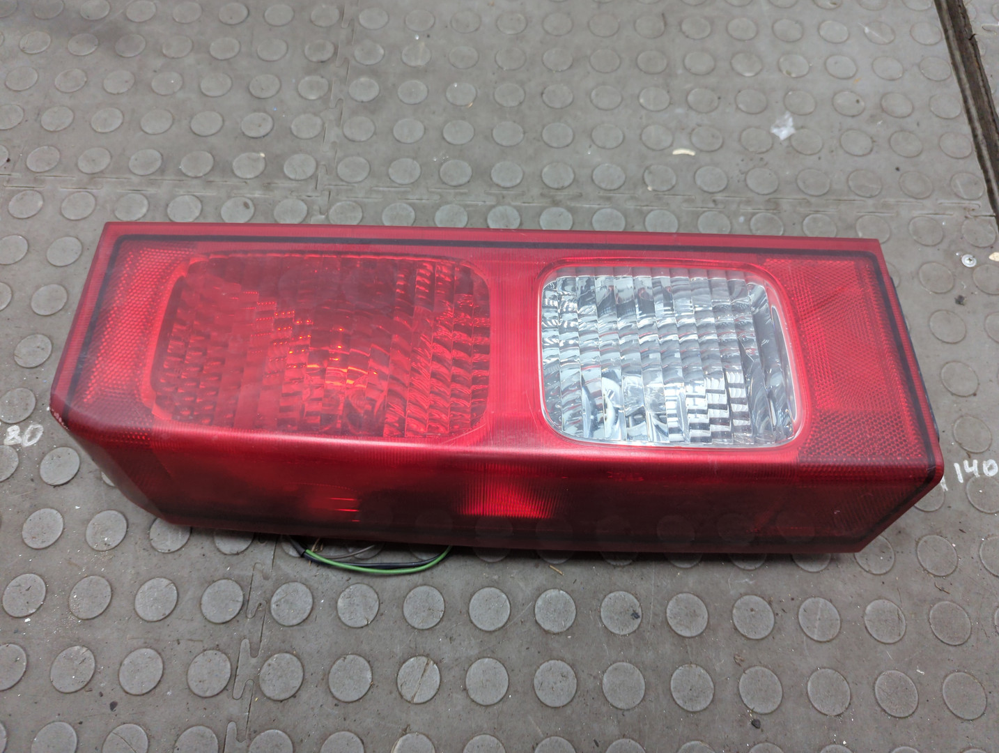 Фонарь задний левый