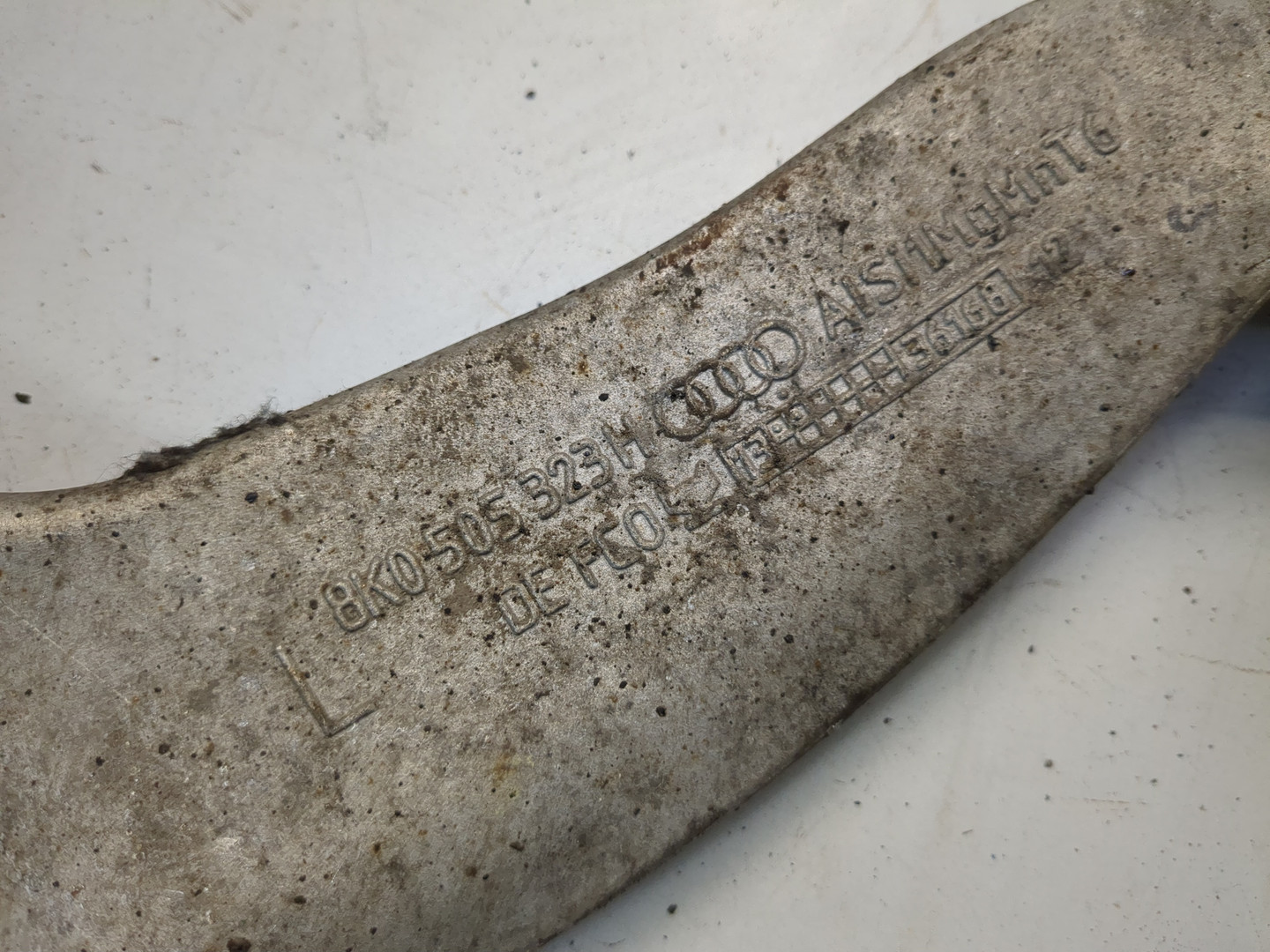 Рычаг задний левый