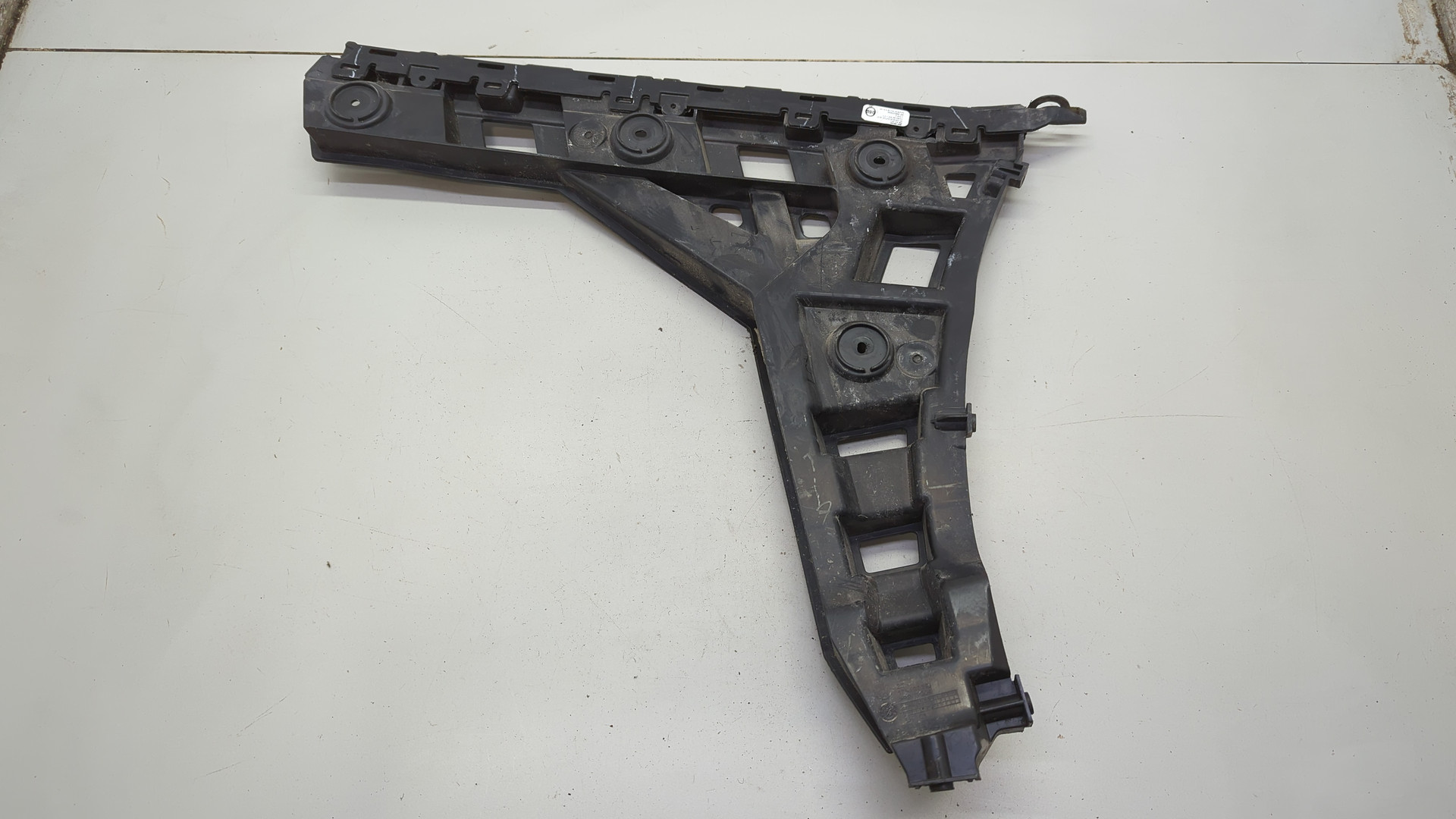 Кронштейн заднего бампера левый