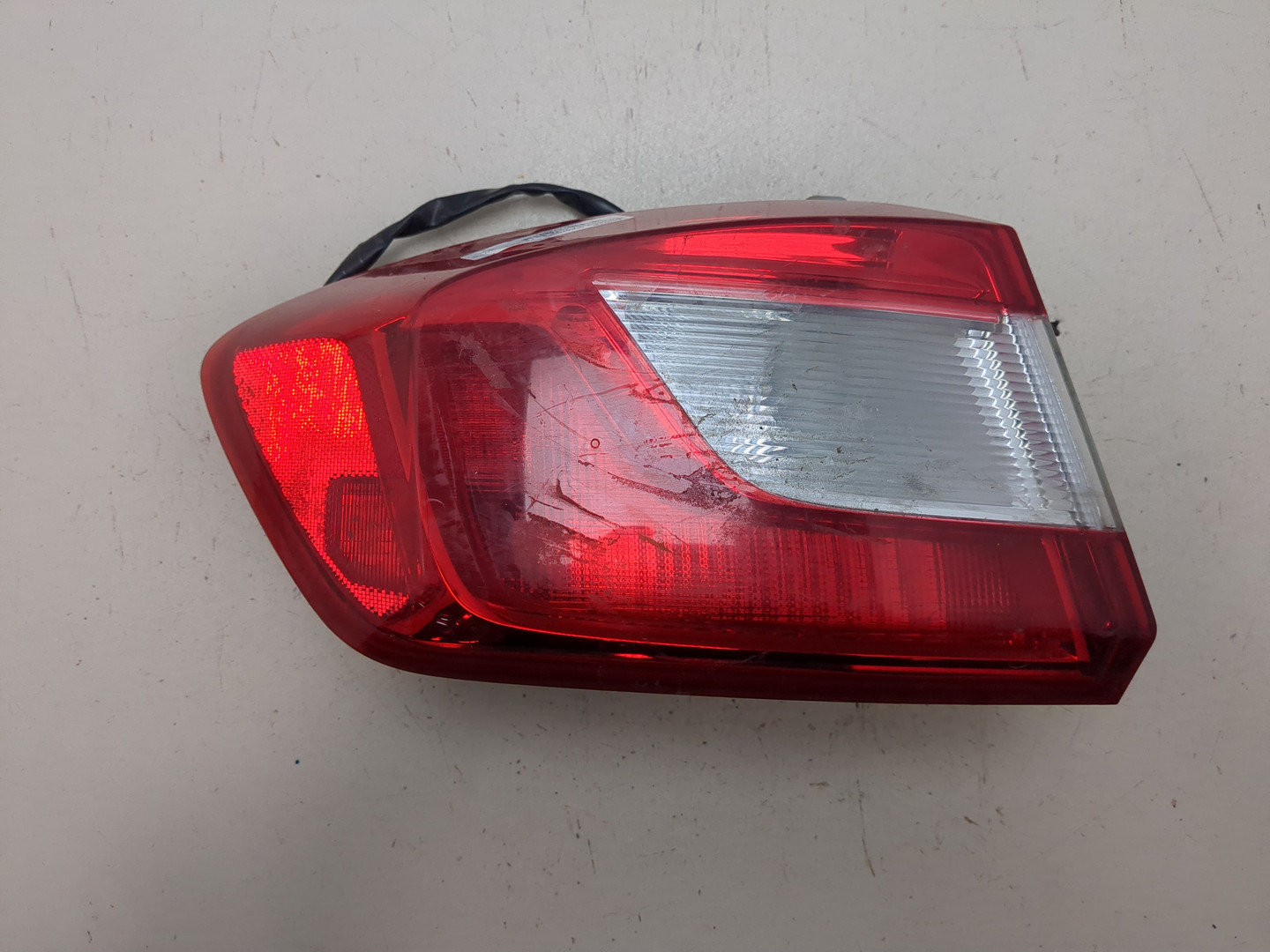 Фонарь задний левый