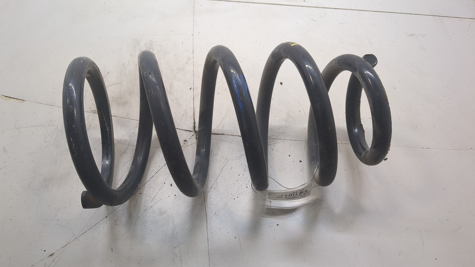 Пружина задняя