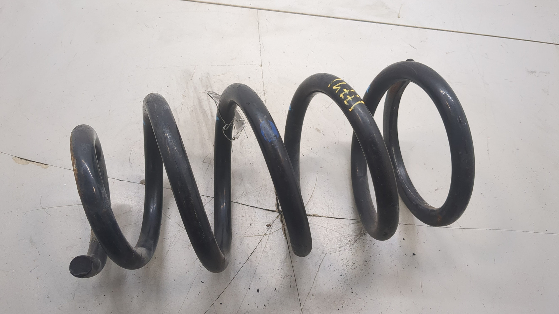 Пружина задняя