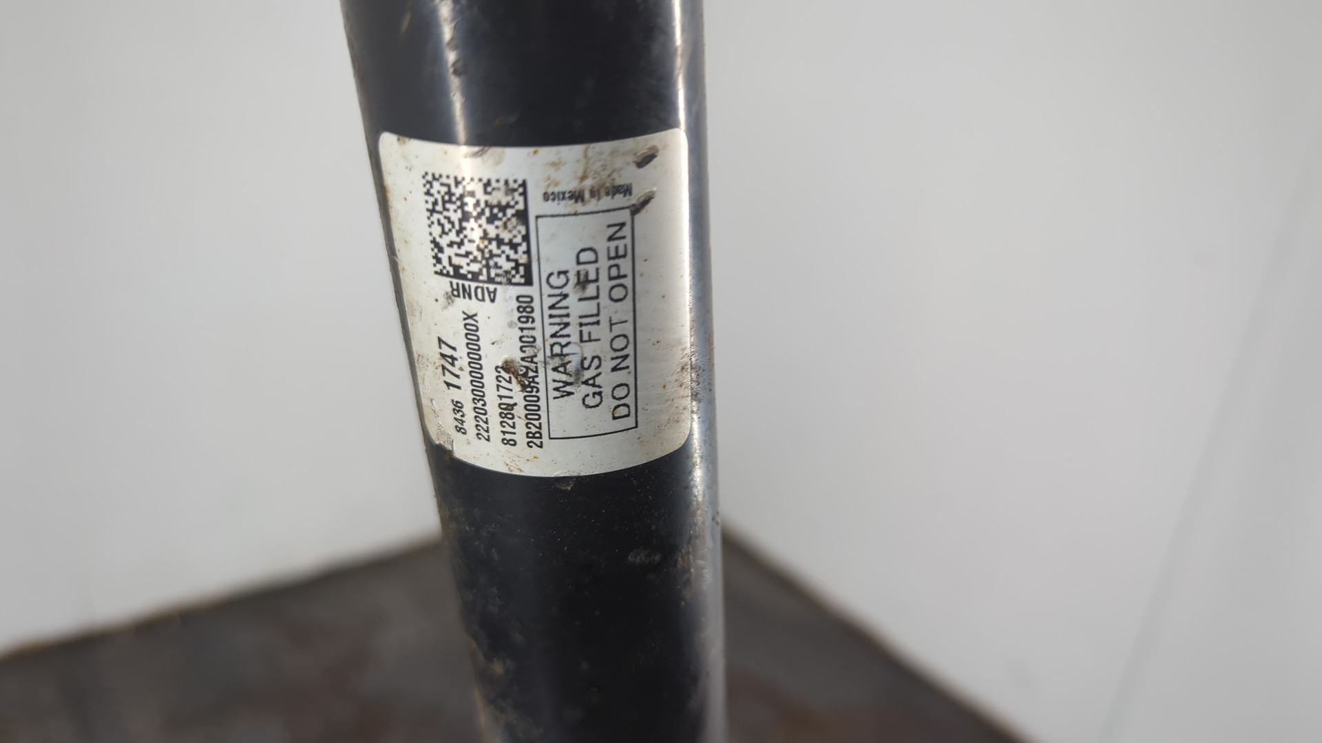 Амортизатор задний левый