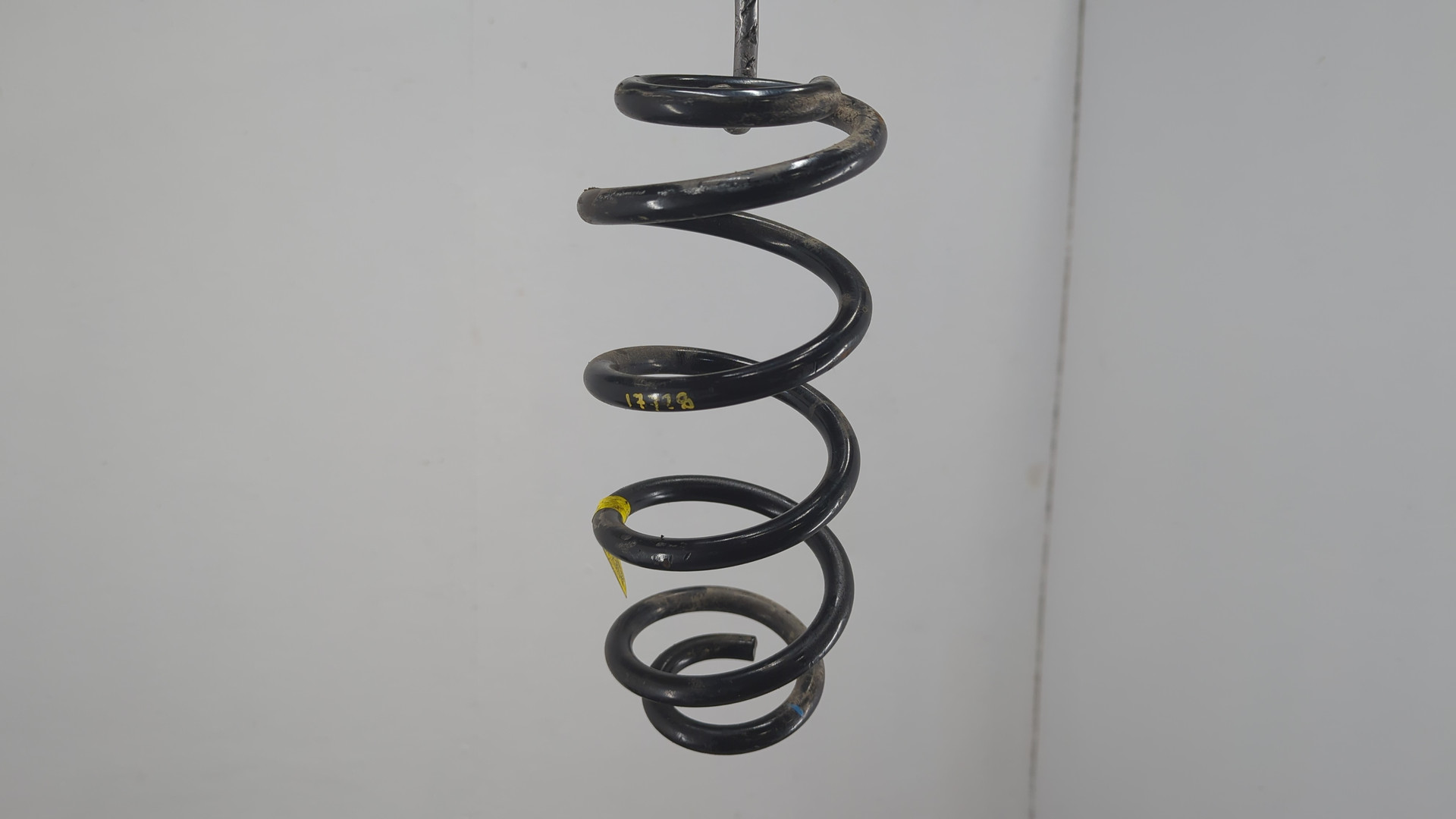 Пружина задняя