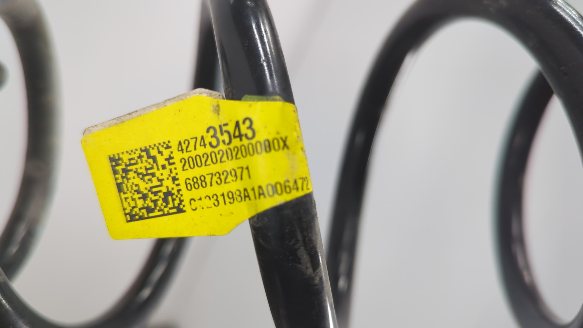 Пружина задняя