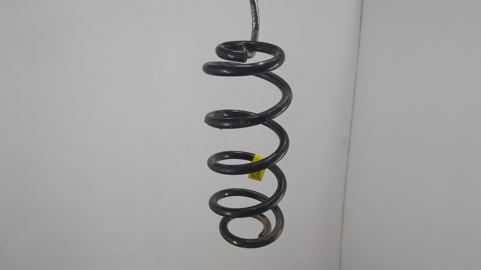 Пружина задняя