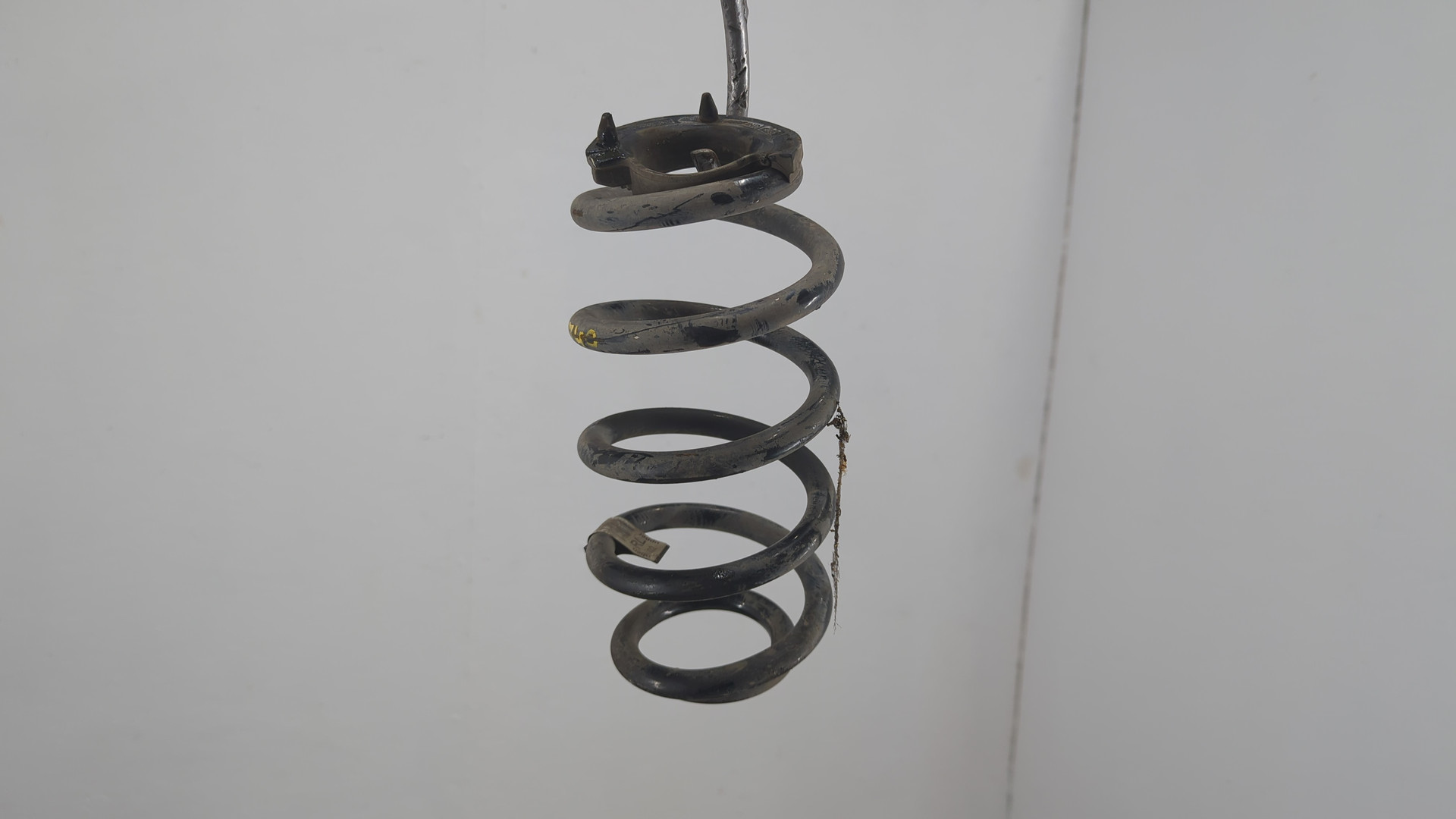 Пружина задняя