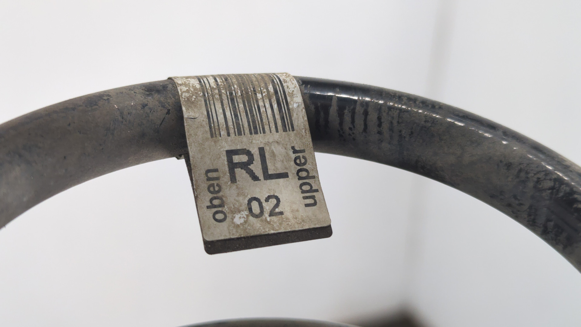 Пружина задняя