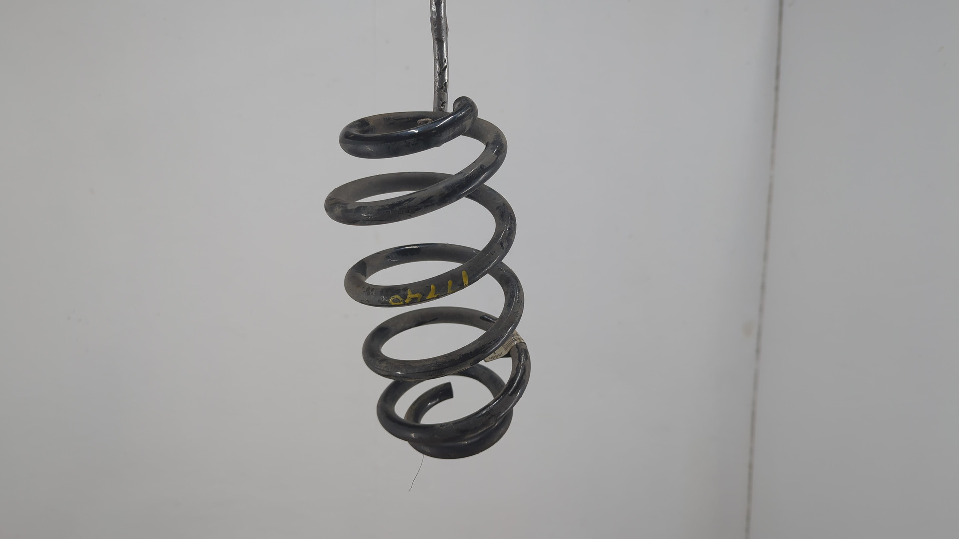 Пружина задняя