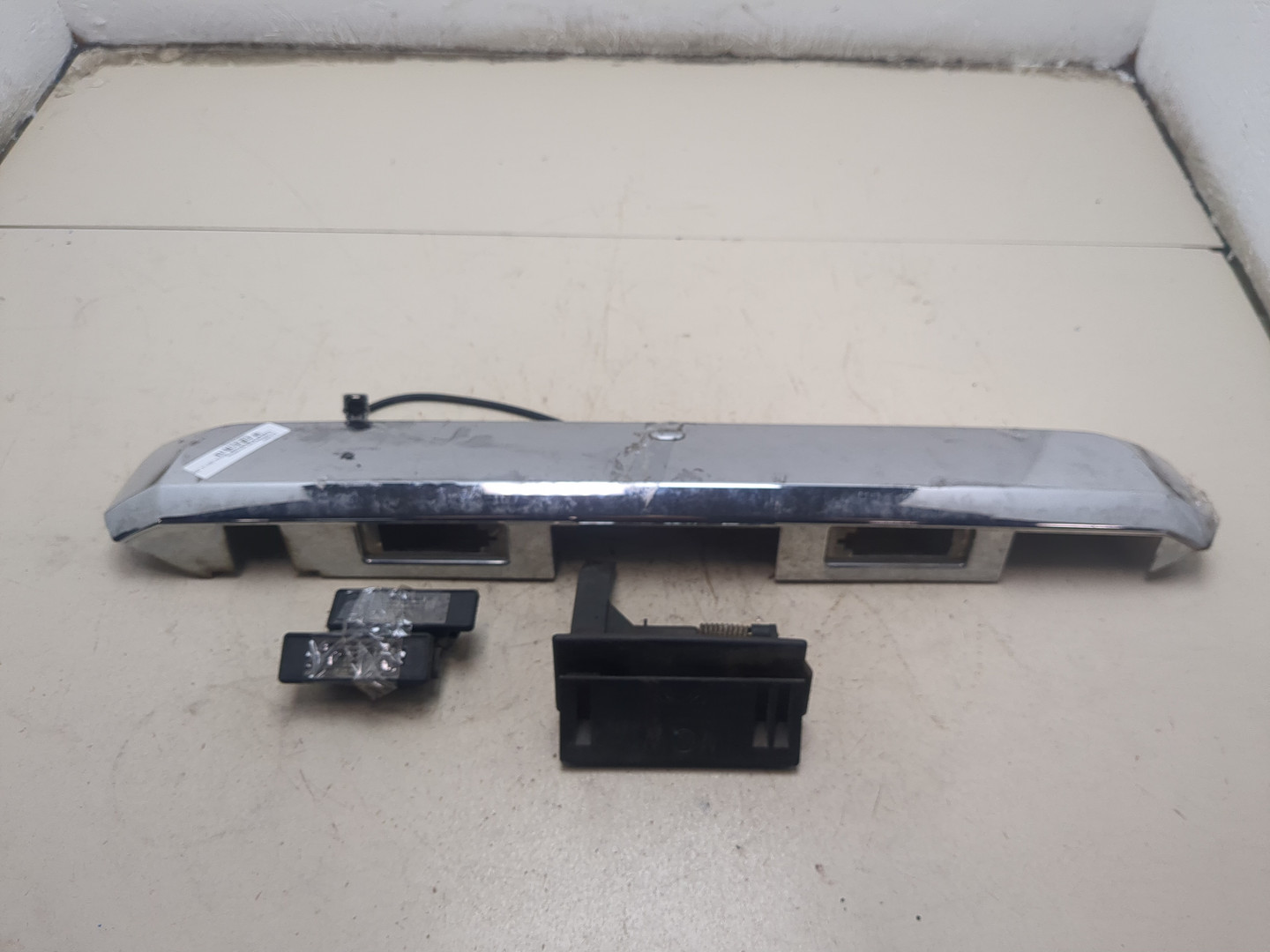 Фонарь подсветки номера