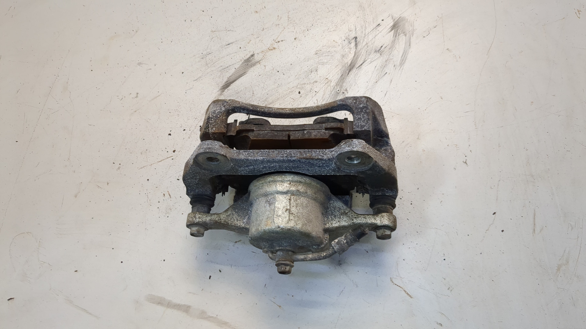 Суппорт передний левый