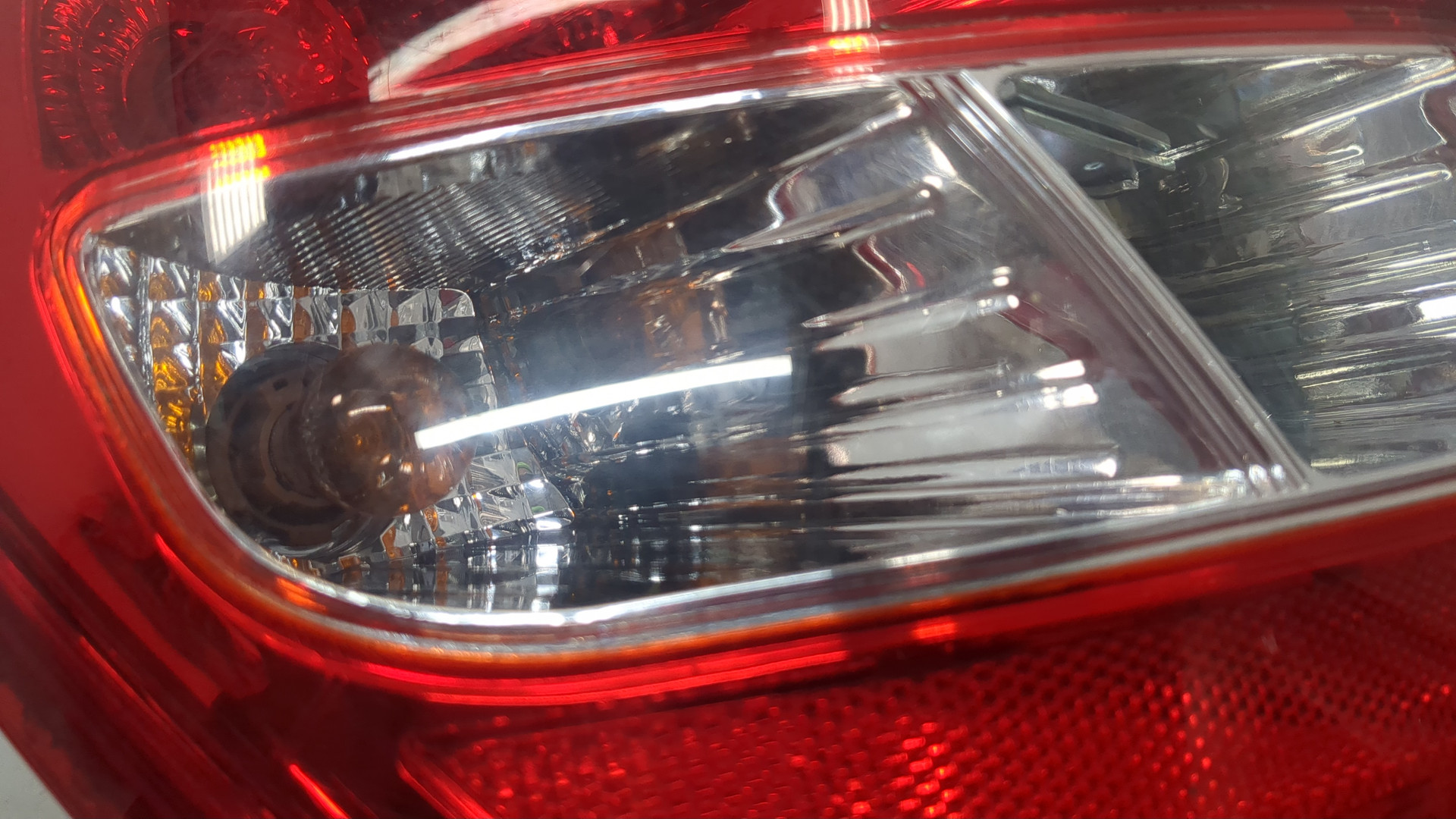 Фонарь задний левый