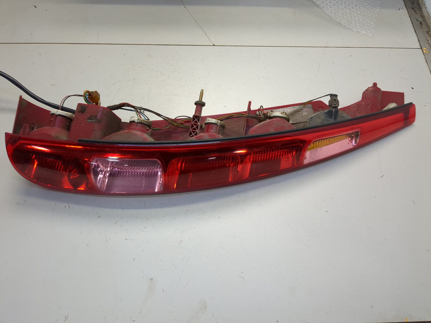 Фонарь задний левый