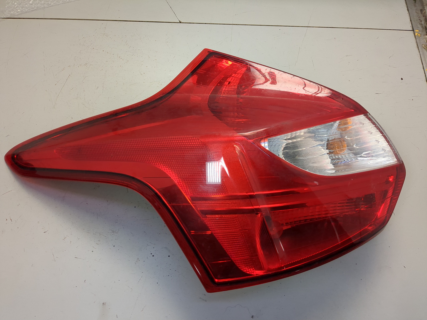 Фонарь задний левый