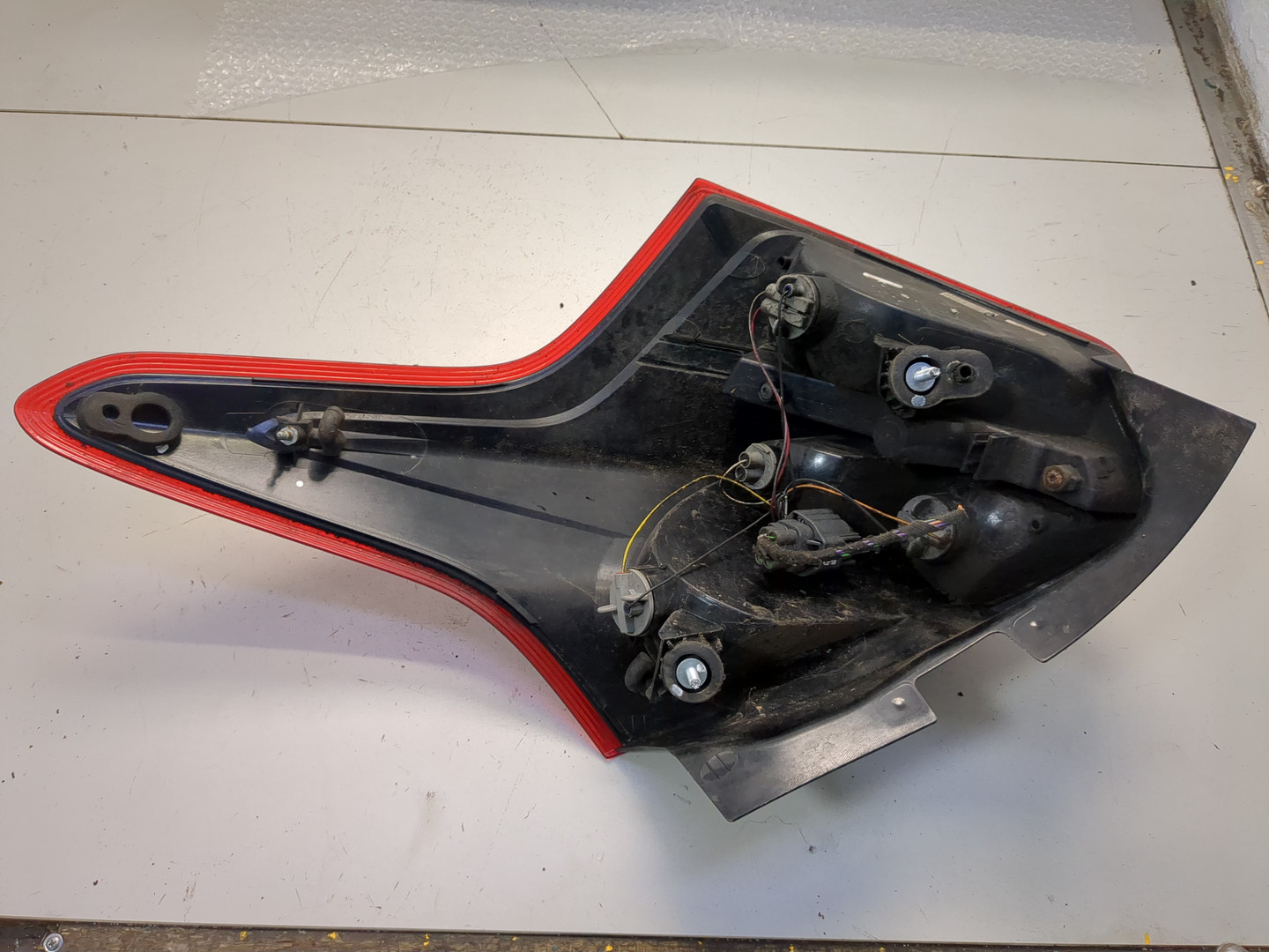 Фонарь задний левый