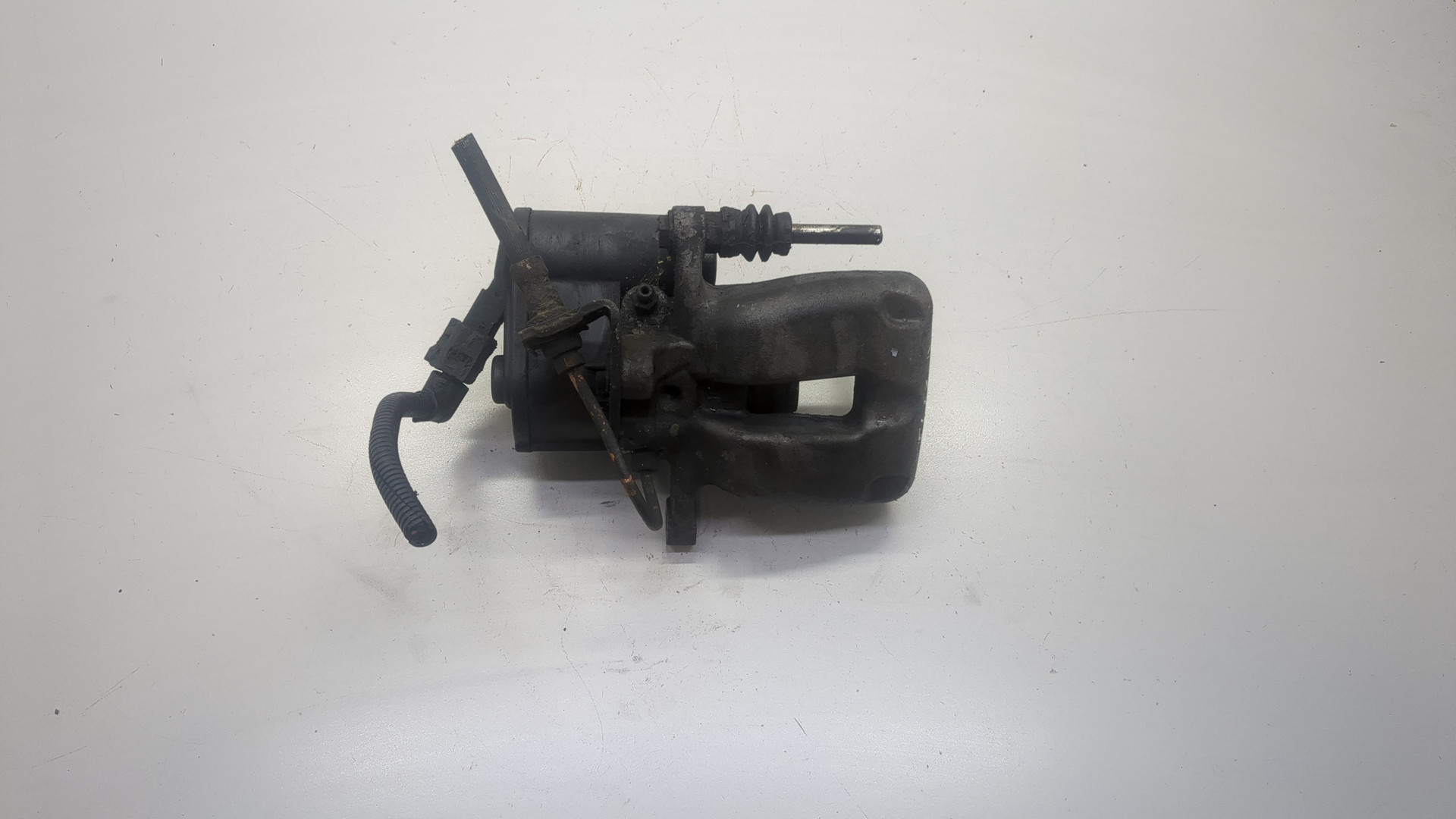 Суппорт задний левый