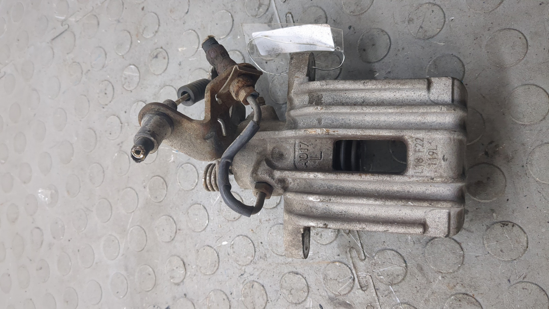 Суппорт задний левый