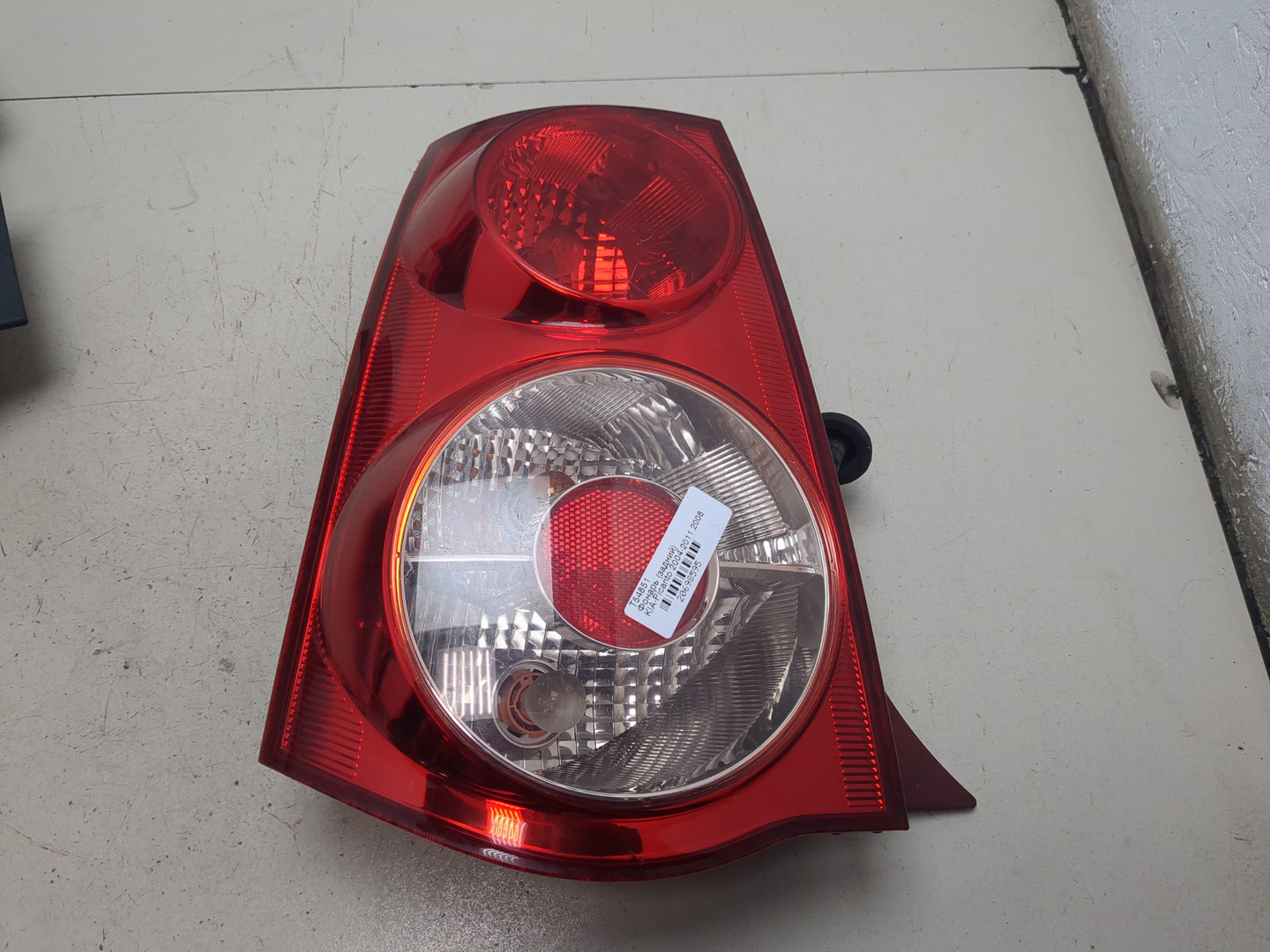 Фонарь задний левый