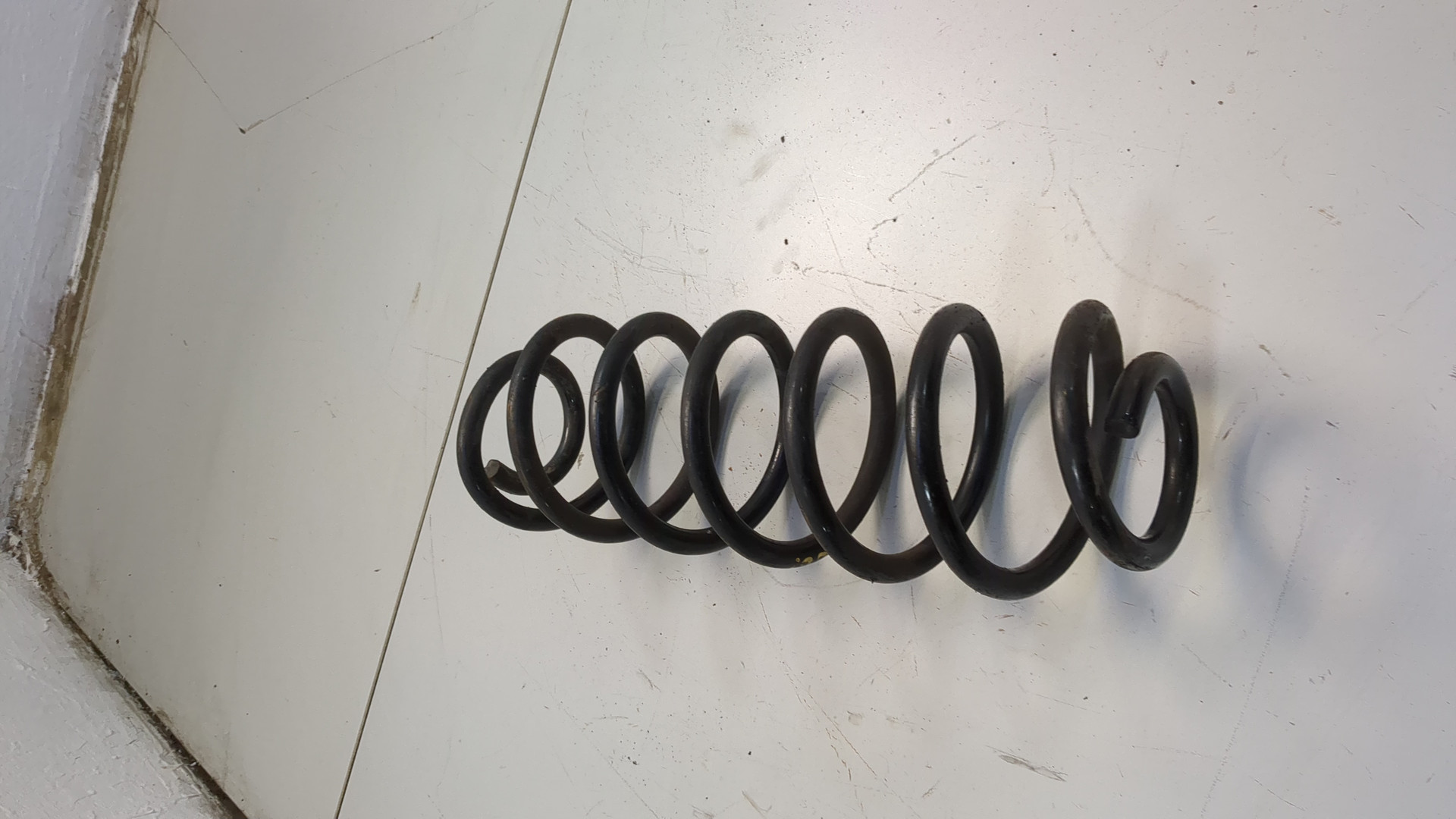 Пружина задняя