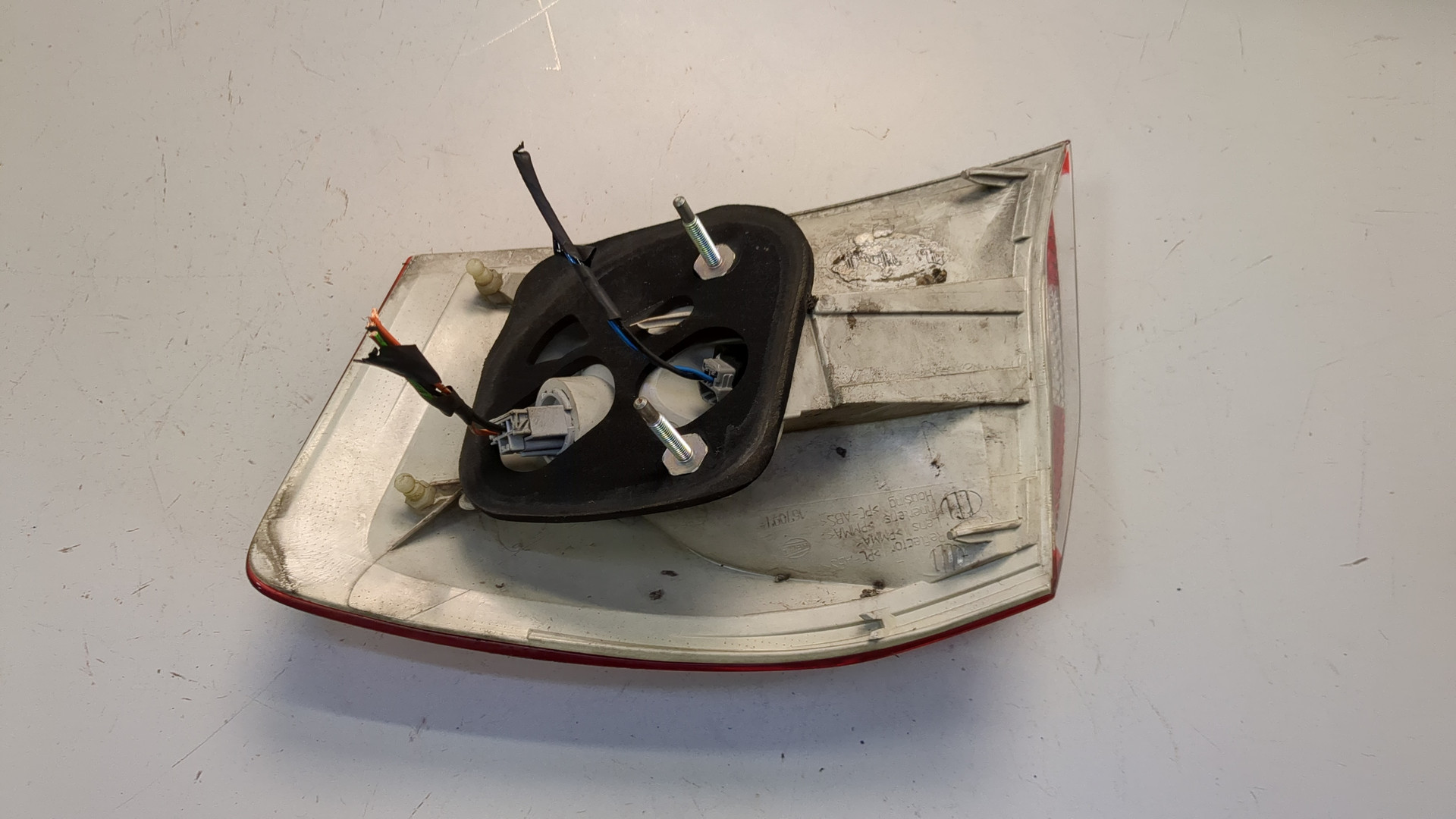 Фонарь задний левый