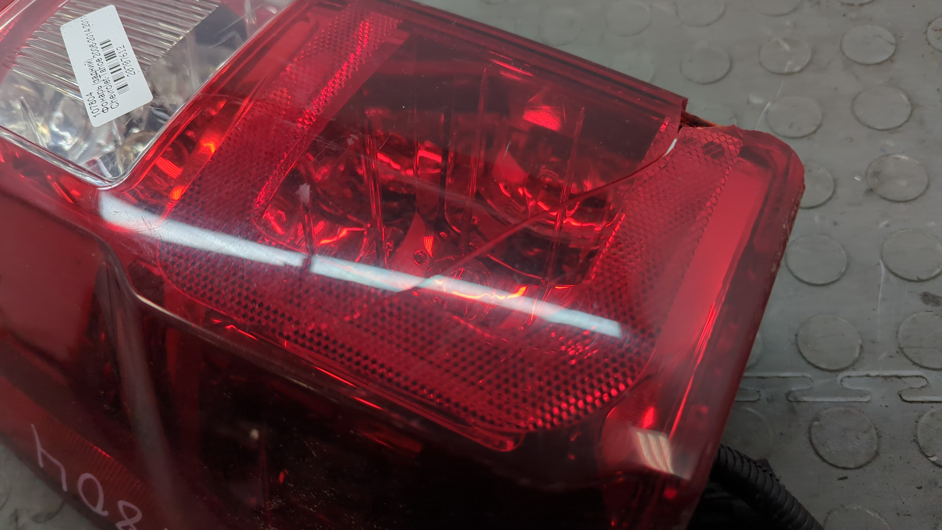 Фонарь задний левый