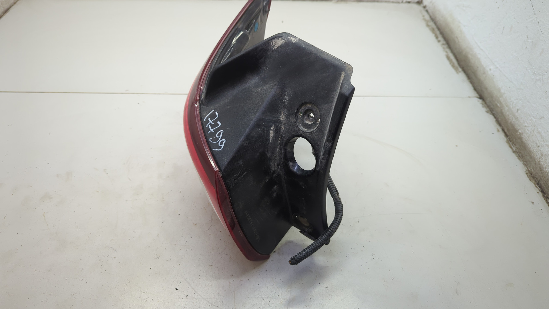 Фонарь задний левый