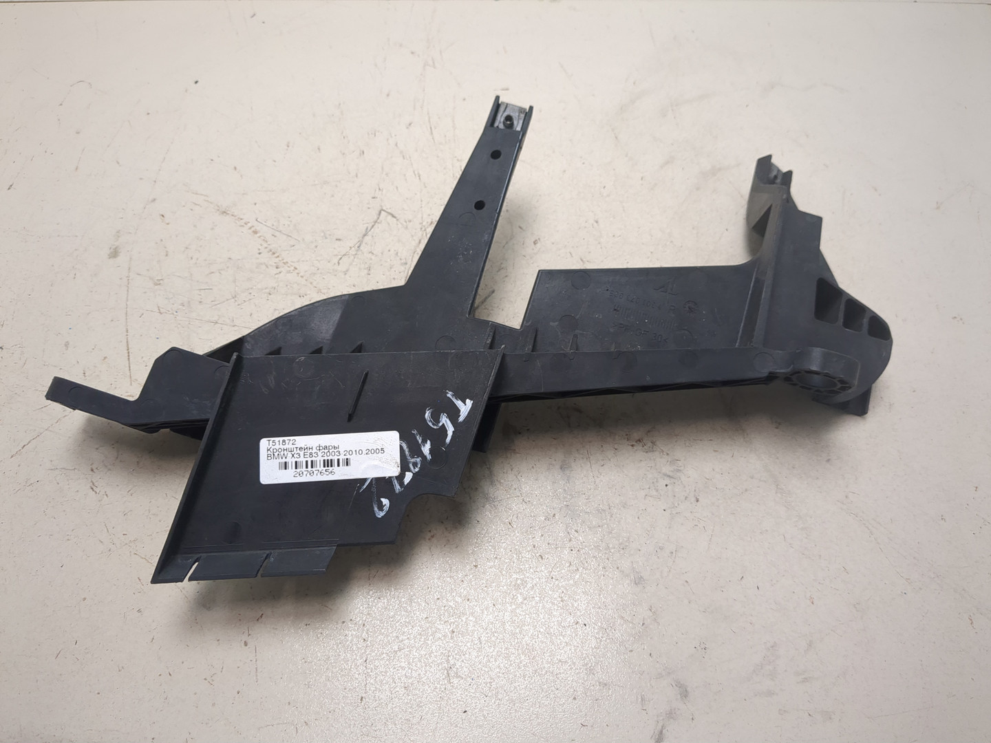 Кронштейн фар правый