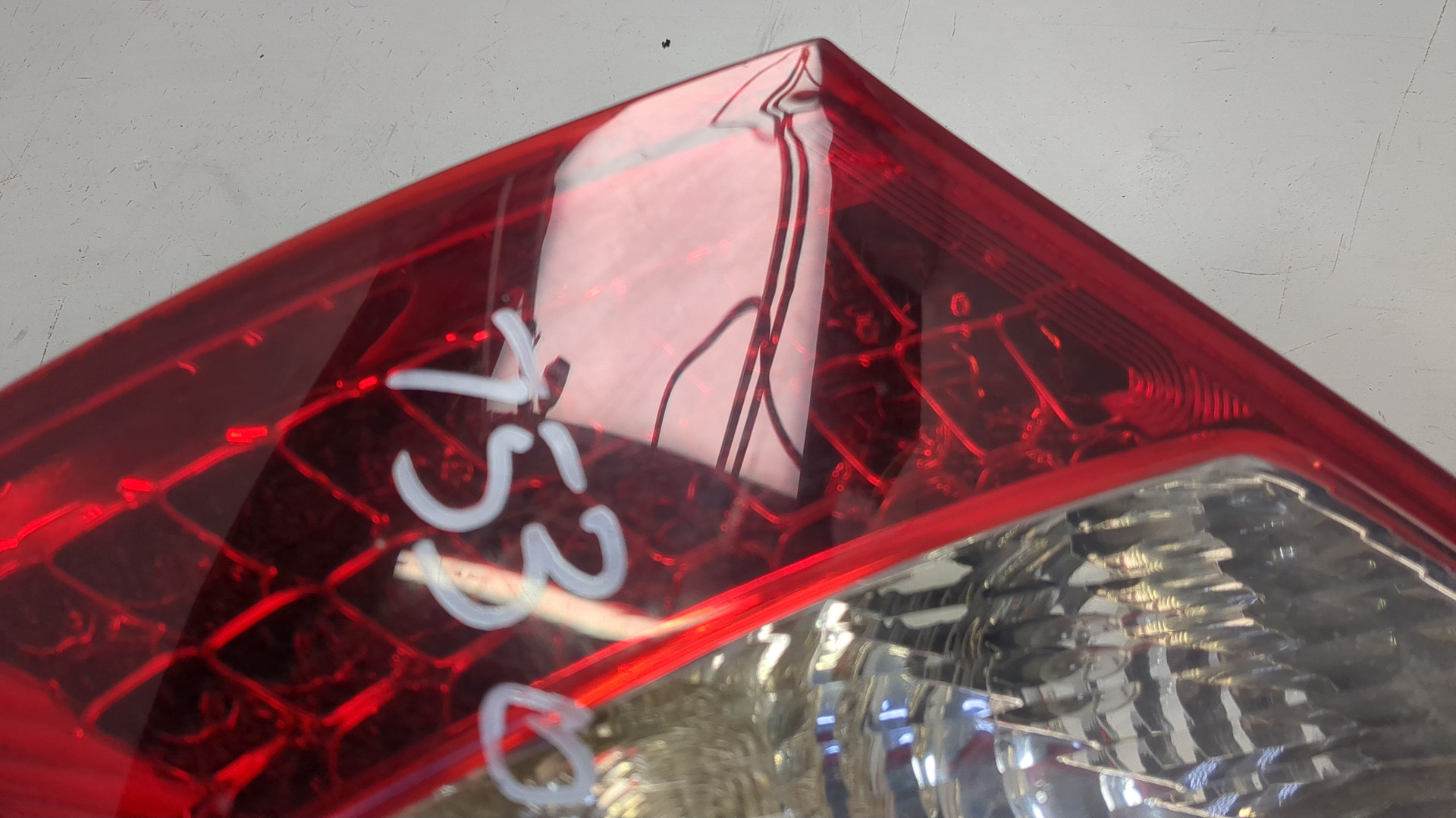 Фонарь задний левый