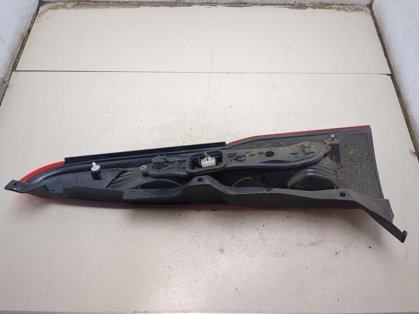 Фонарь задний левый