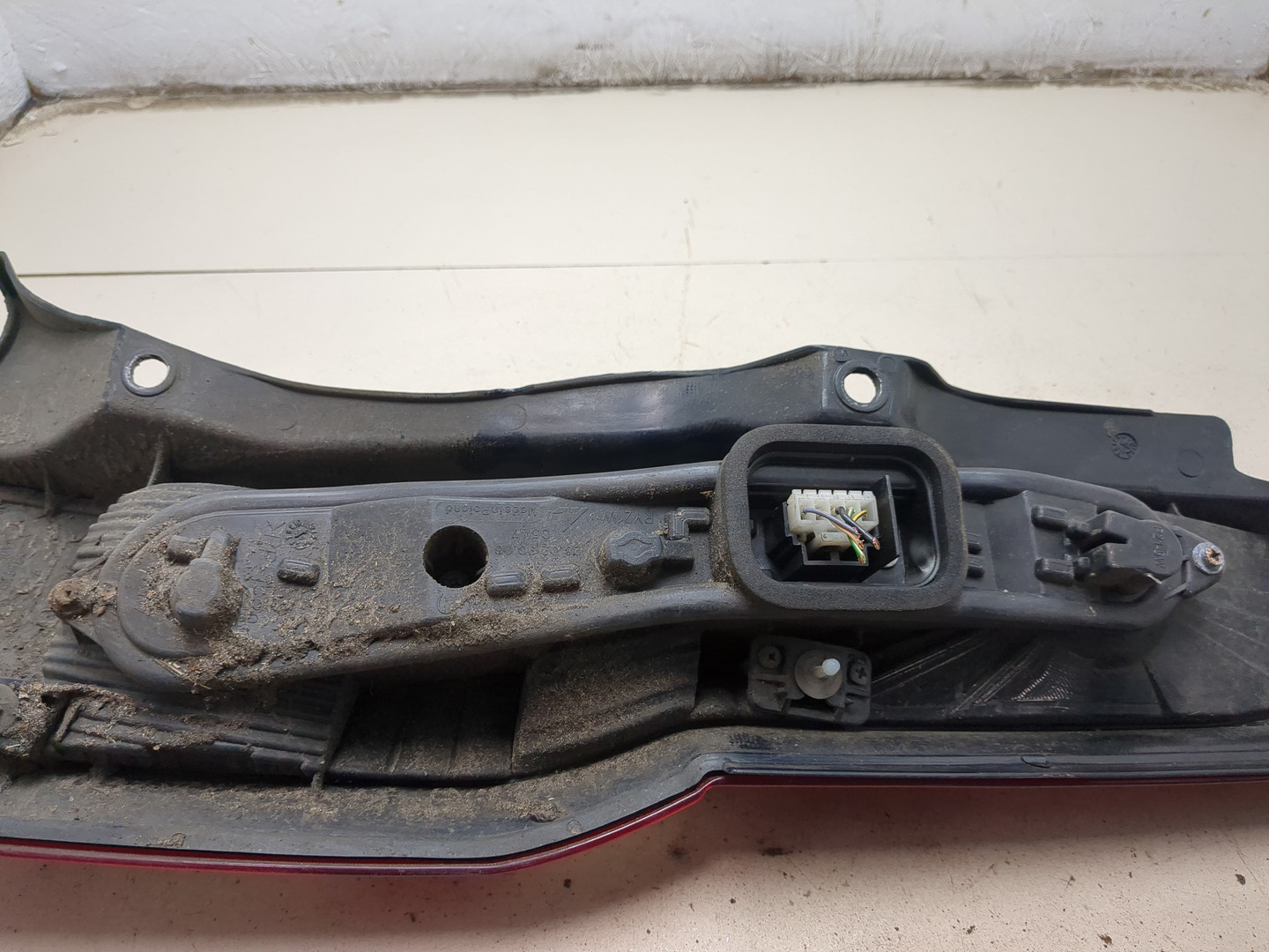 Фонарь задний левый