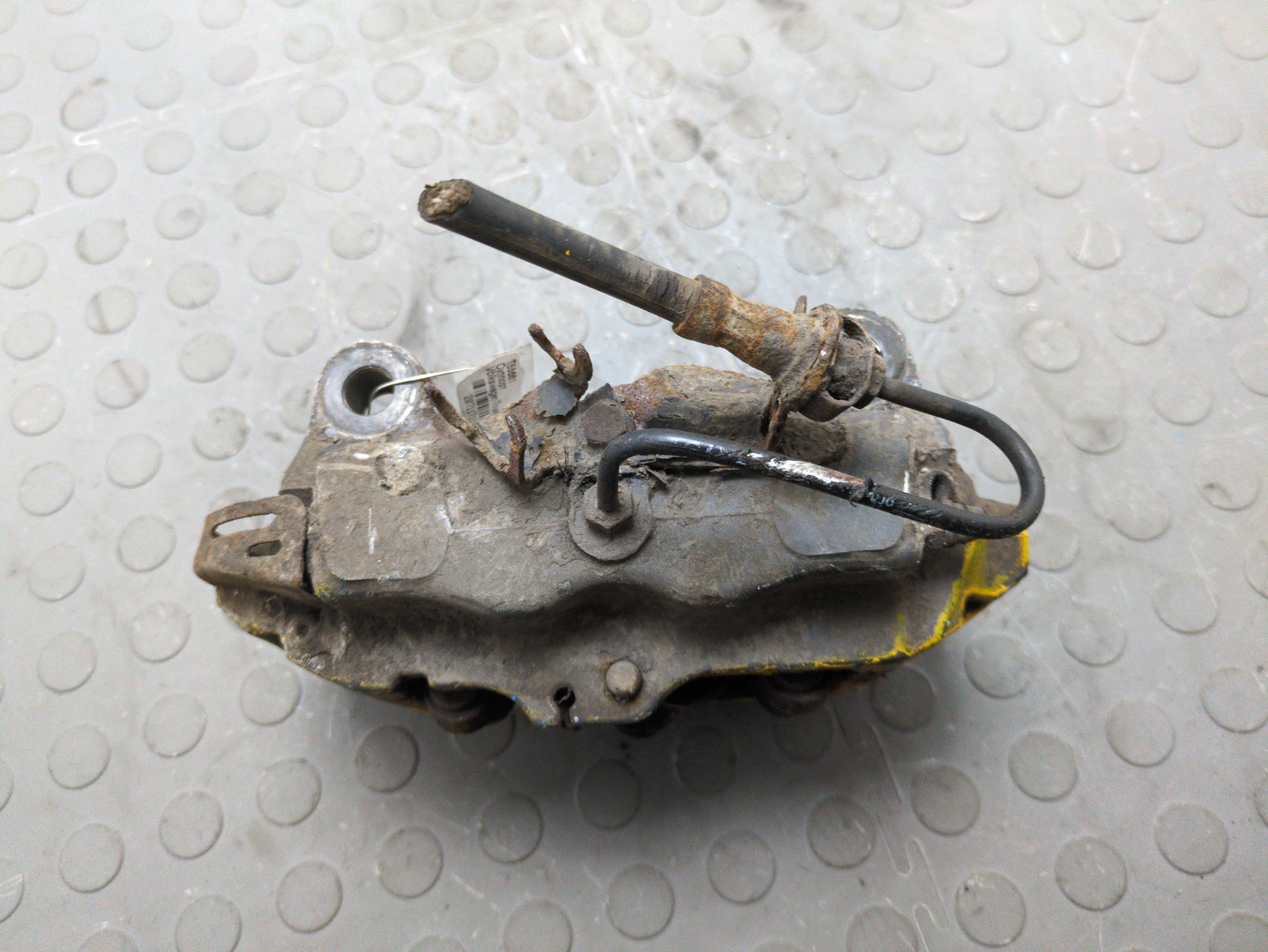 Суппорт задний левый