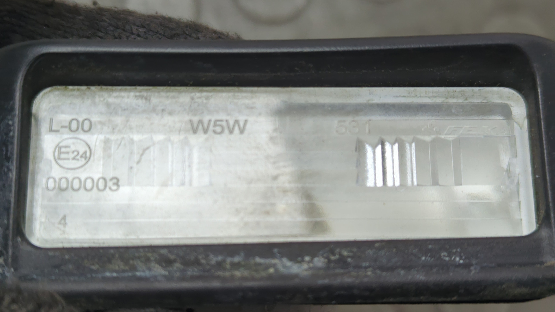 Фонарь подсветки номера