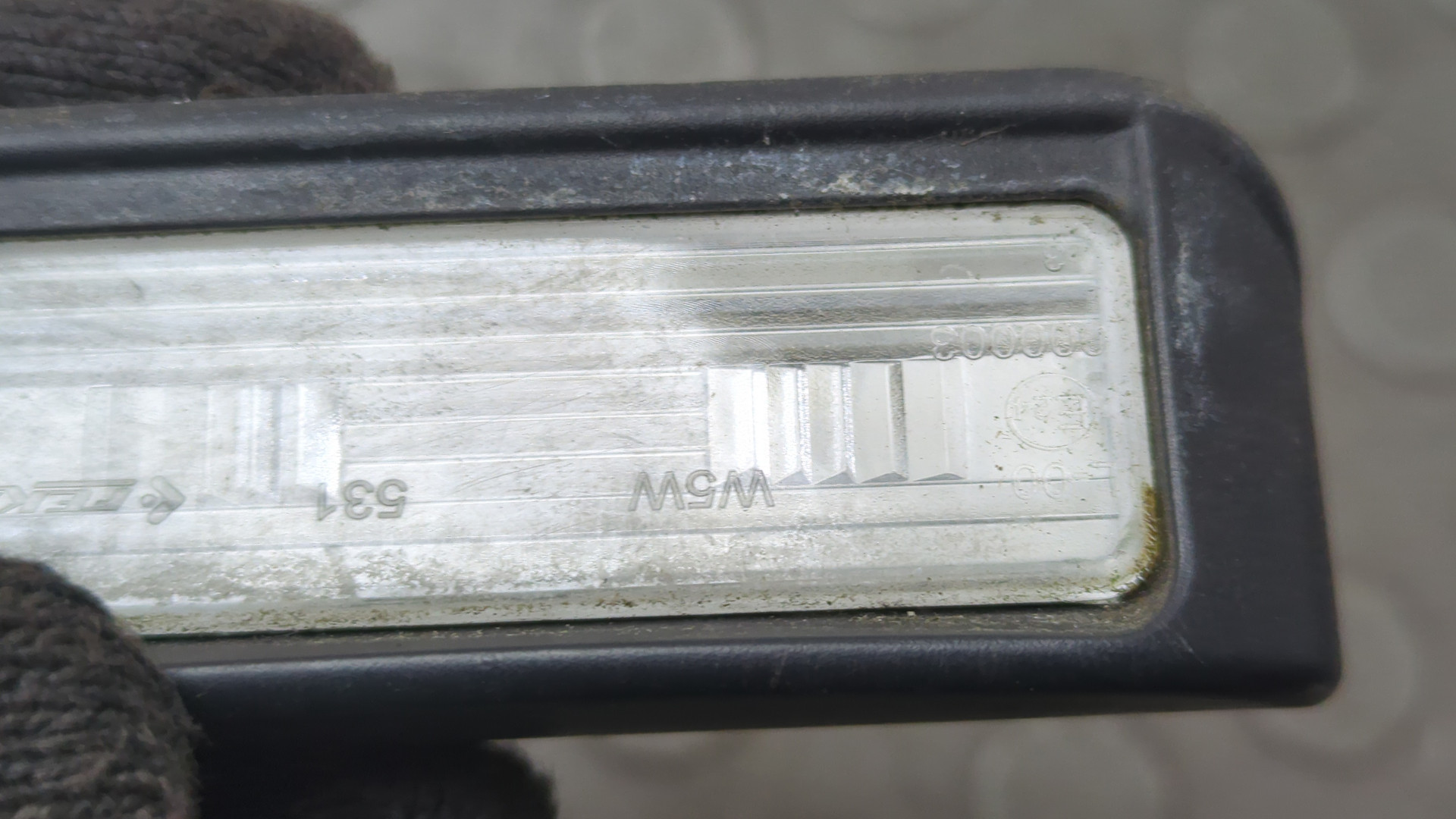 Фонарь подсветки номера