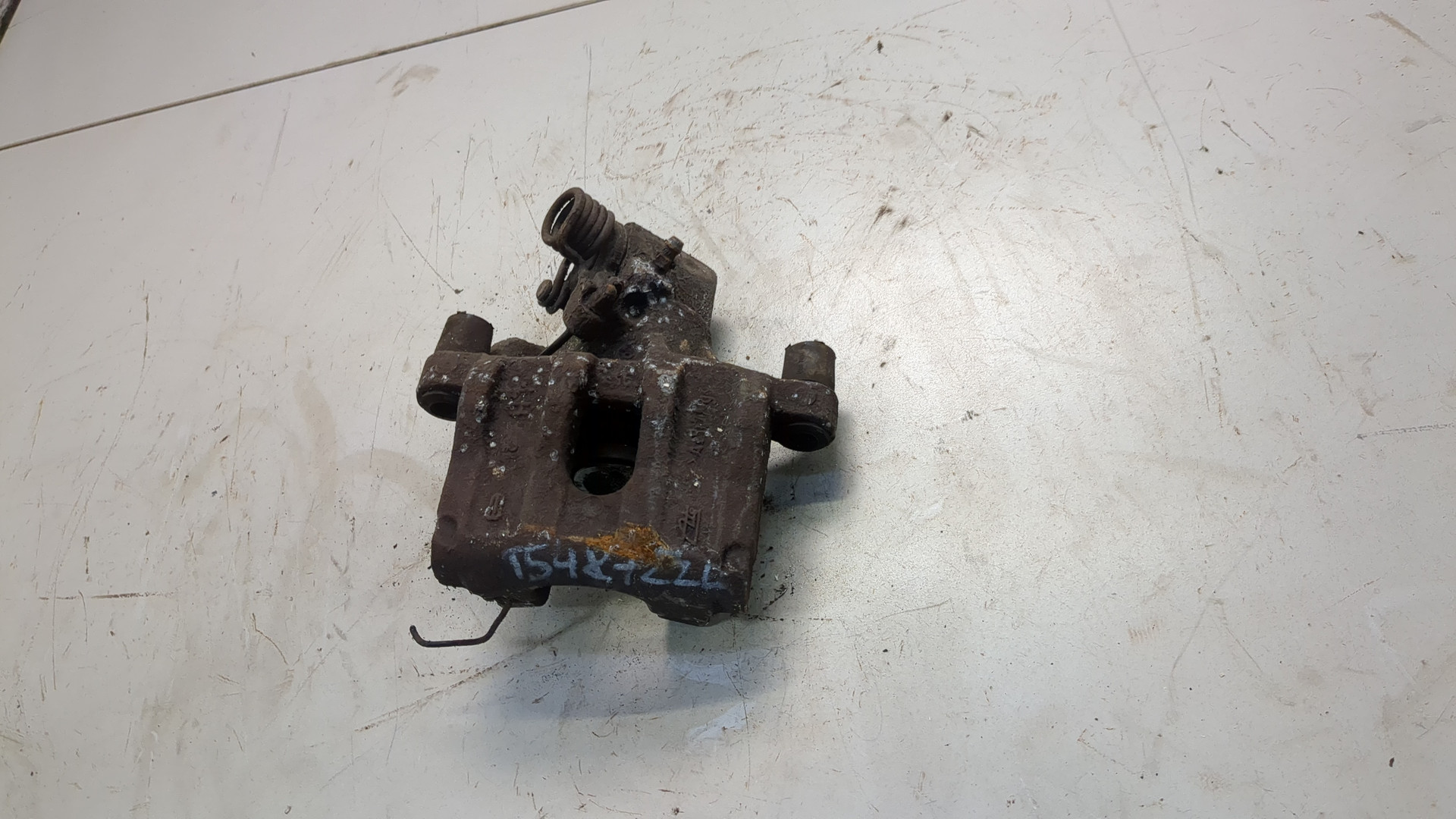 Суппорт задний левый