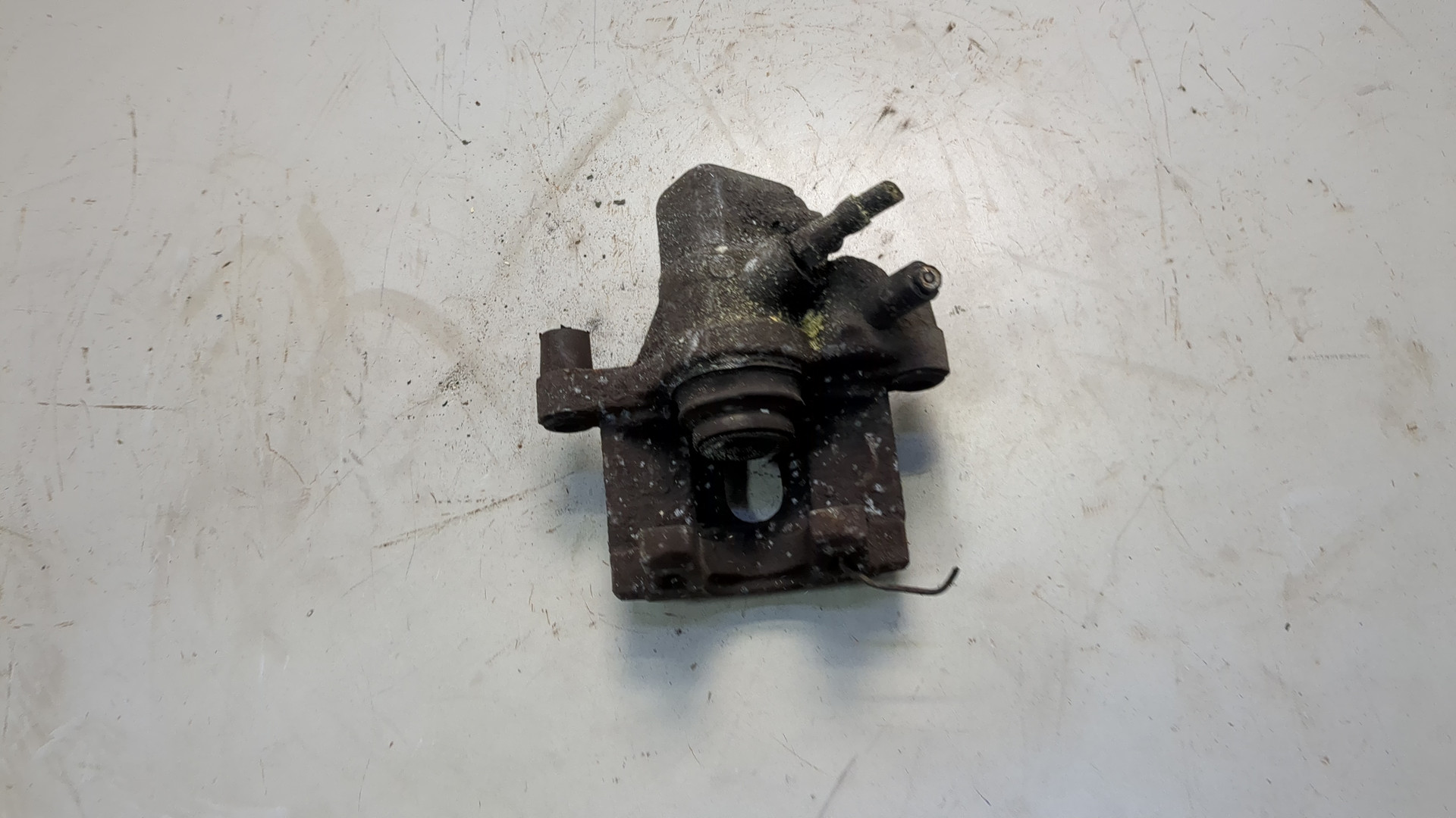 Суппорт задний левый