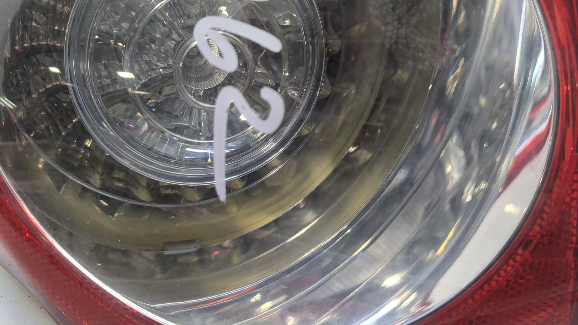 Фонарь задний левый