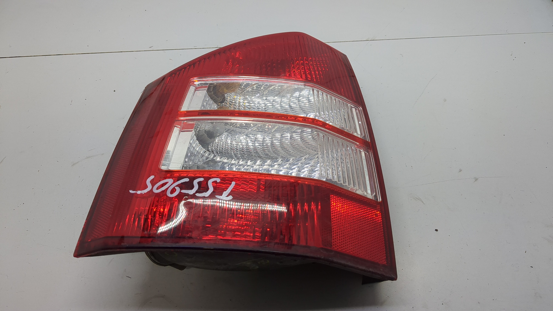 Фонарь задний левый