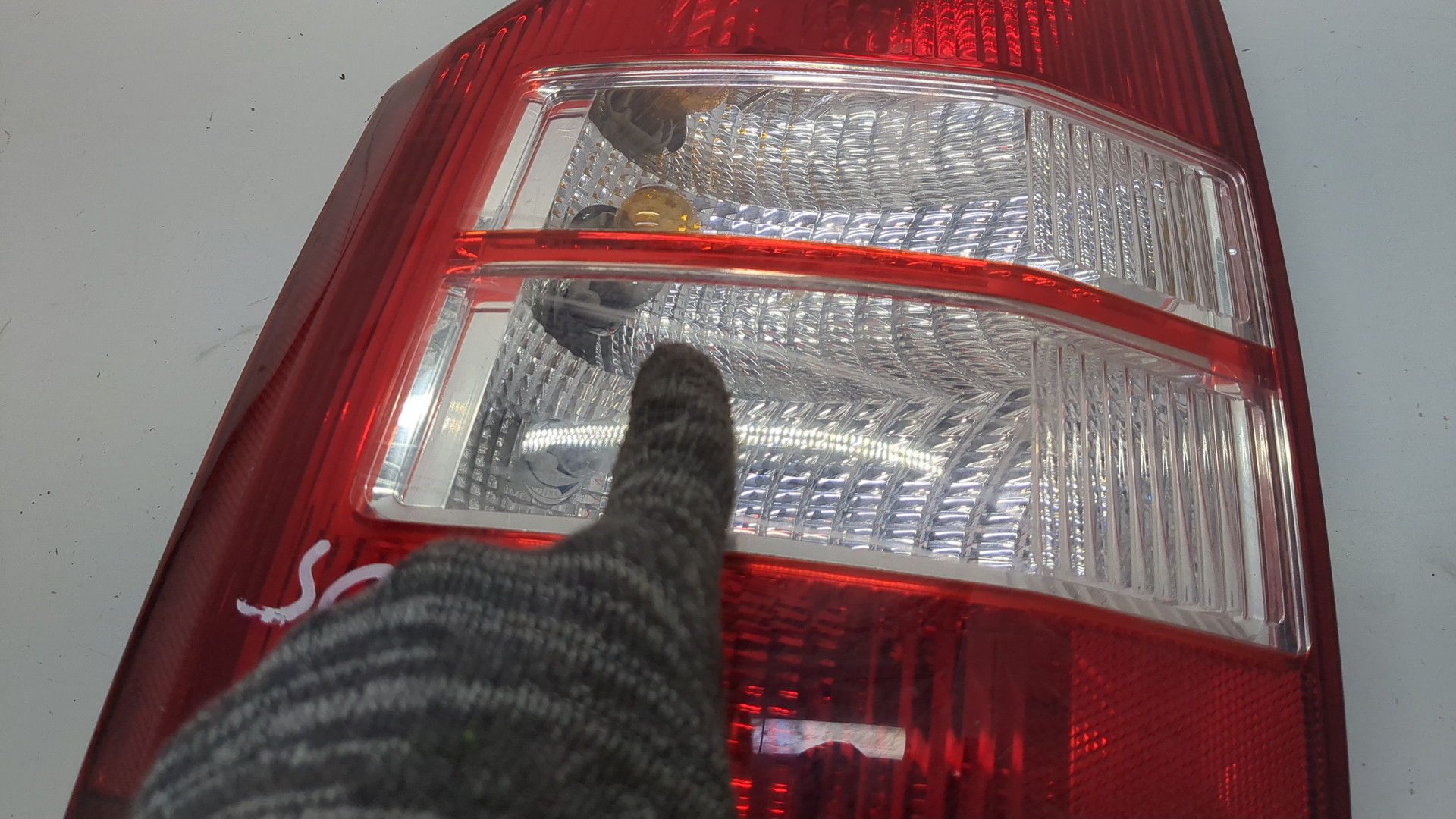 Фонарь задний левый