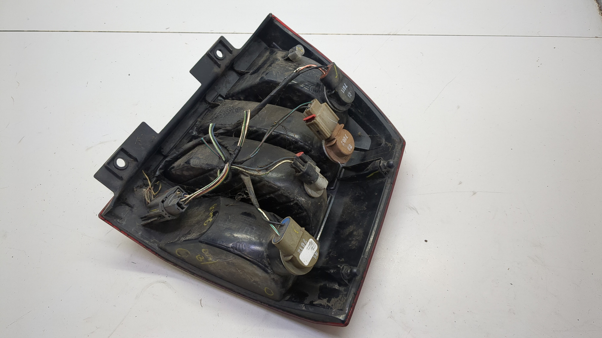 Фонарь задний левый