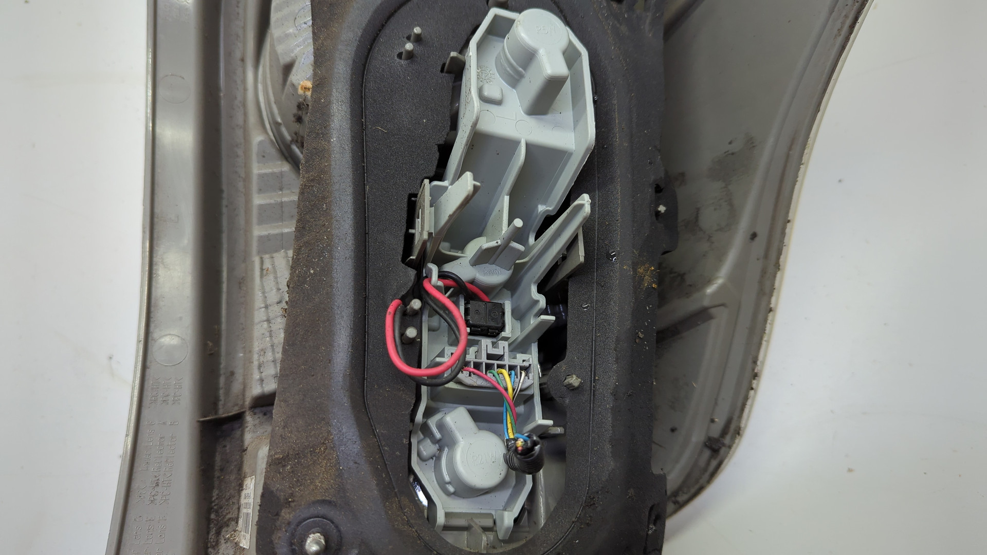 Фонарь задний левый