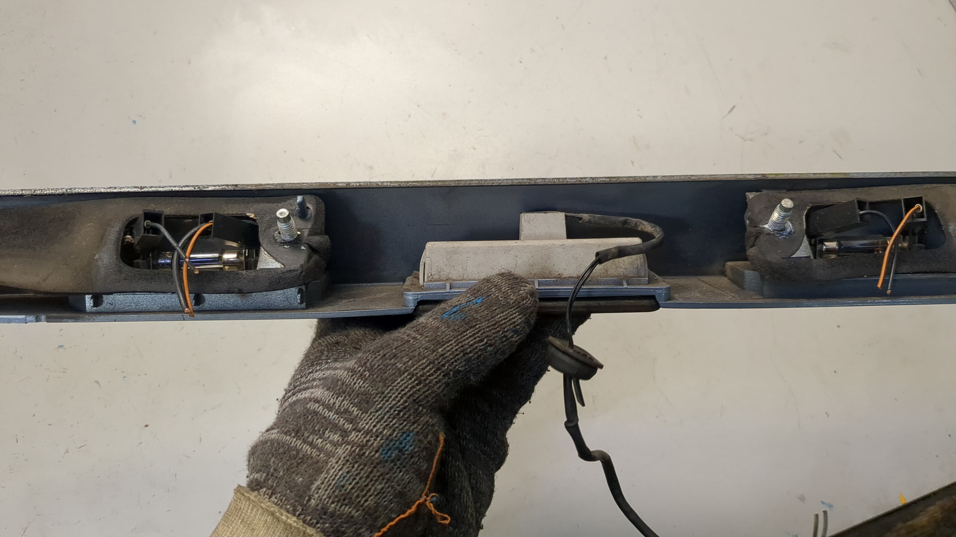 Фонарь подсветки номера