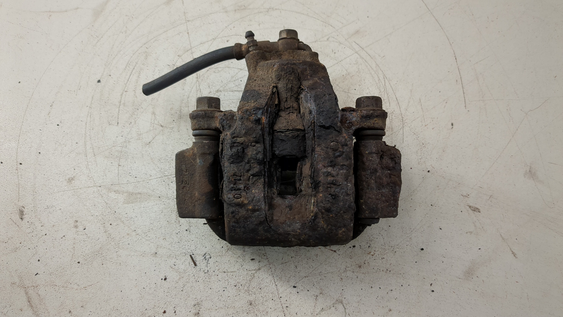 Суппорт задний левый