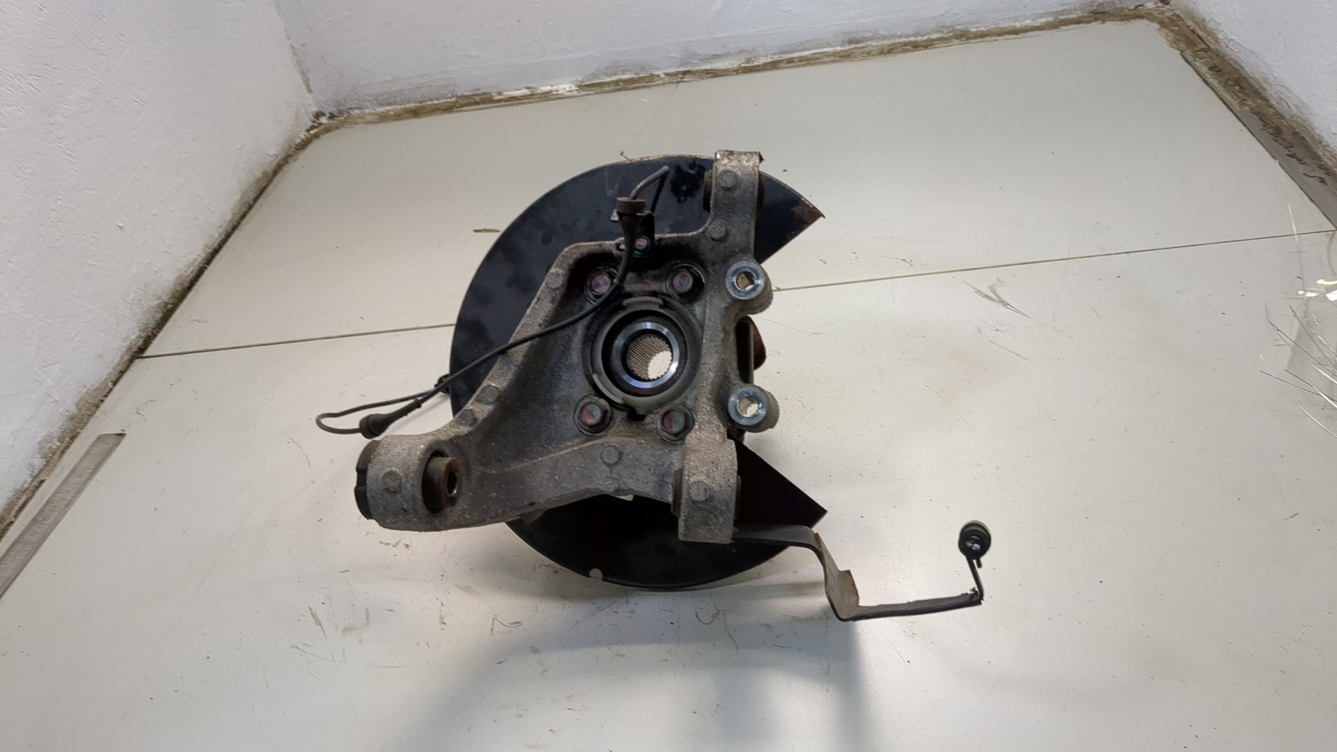 Кулак поворотный задний левый