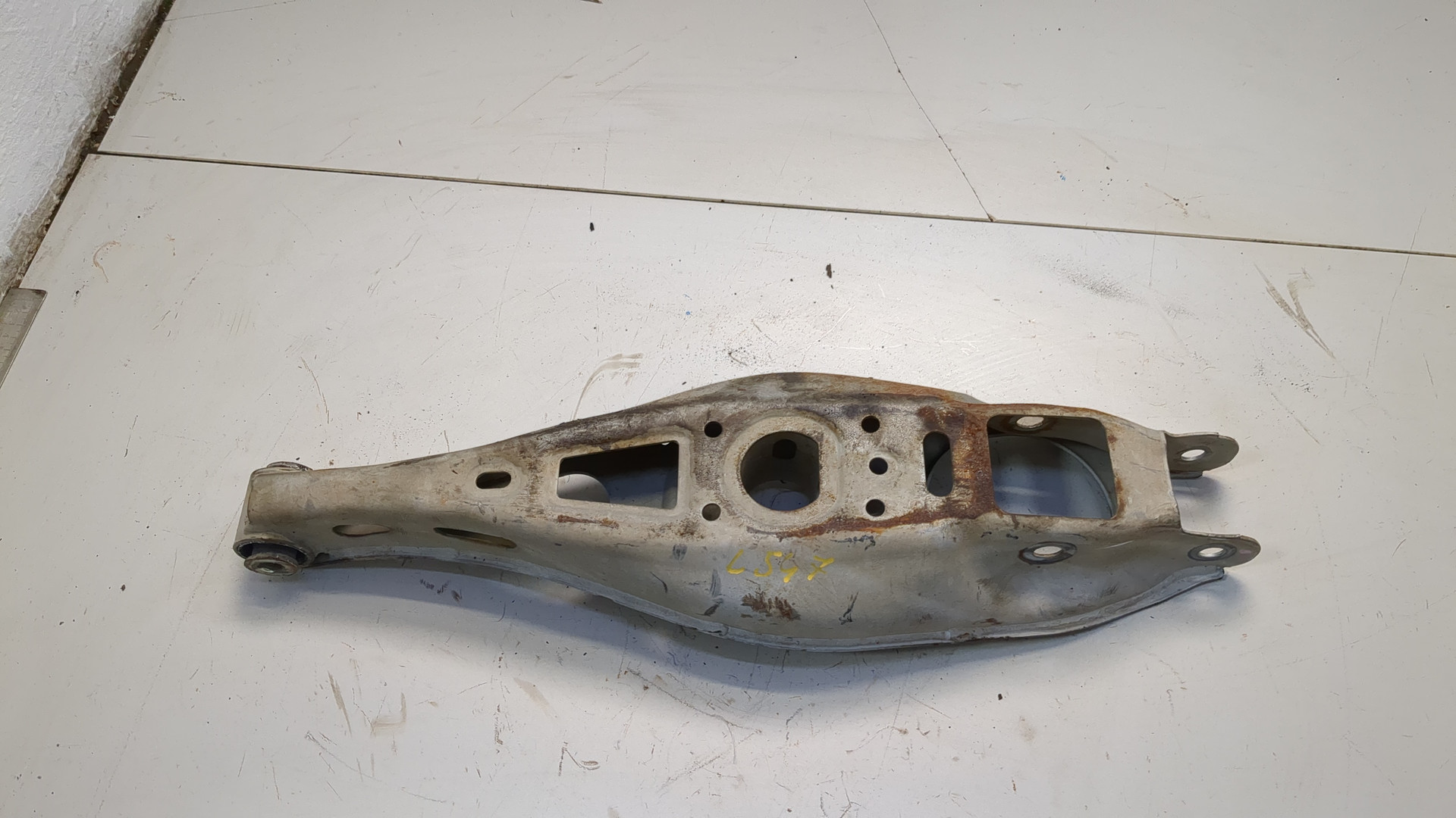 Рычаг задний