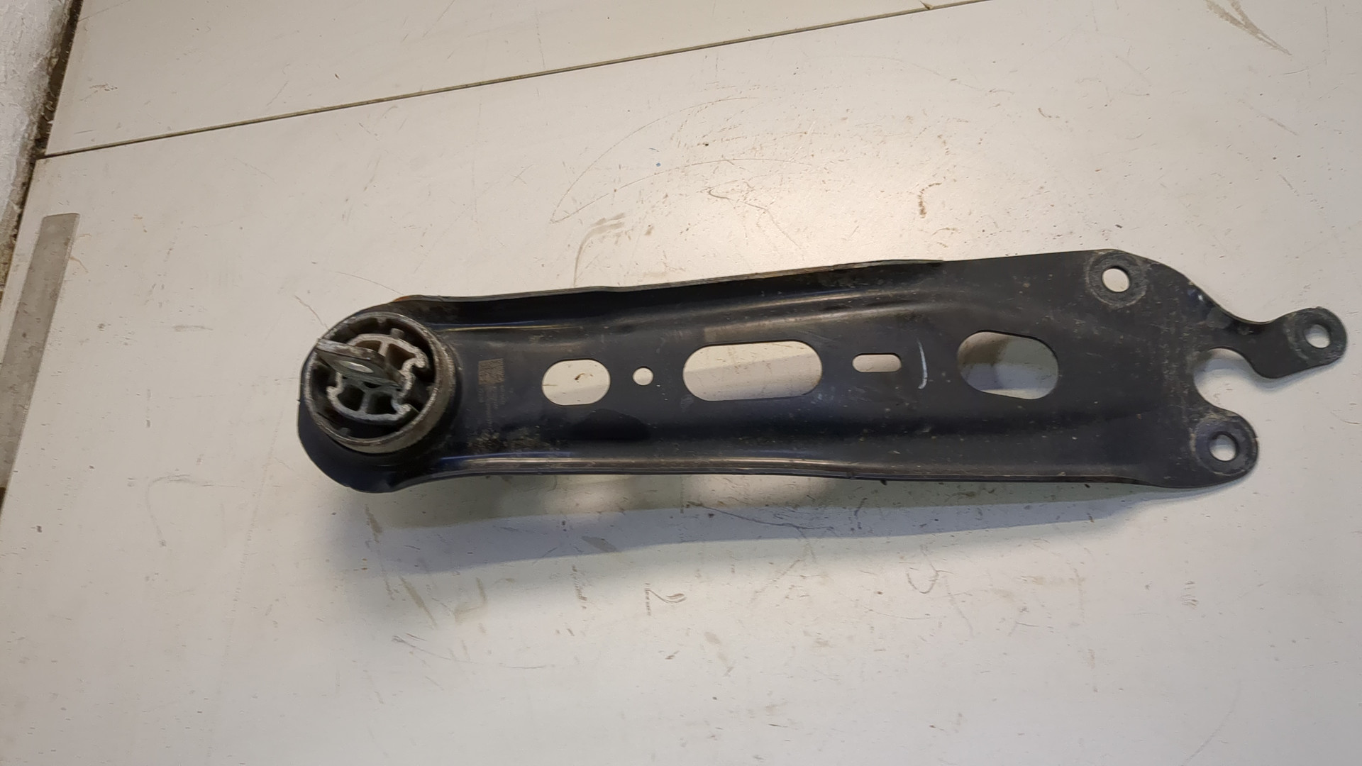 Рычаг задний левый